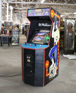 Marvel Super Heroes vs. Street Fighter Arcade Game: Marvel Super Heroes vs. Street Fighter Arcade Game in a Smash TV Cabinet, working. This item requires third party shipping or pickup arrangements to be made. Dimensions: 74 x 29 x 40