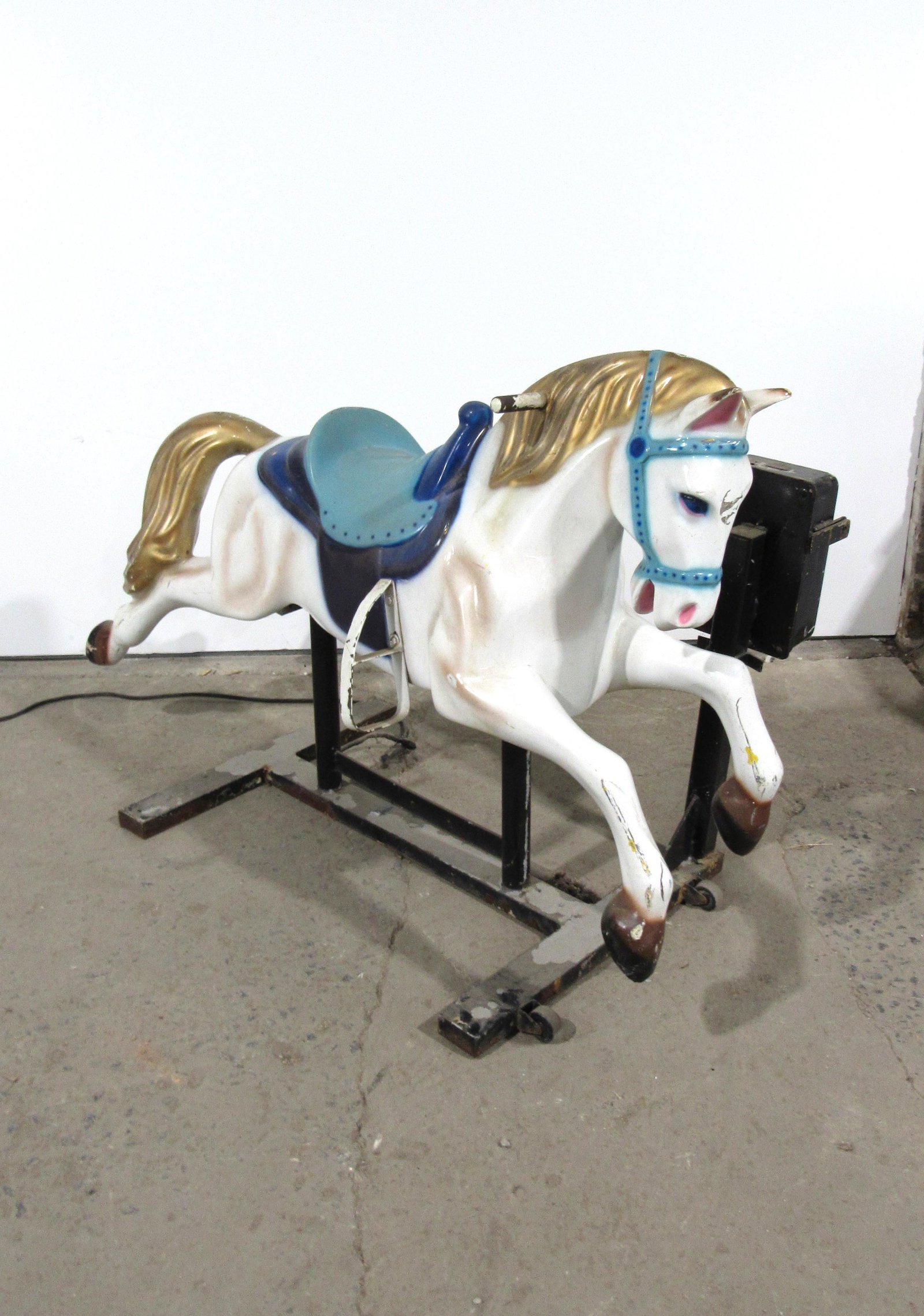 White Horse Coin Operated Kiddie Ride: White Horse Coin Operated Kiddie Ride, working with sound. This item requires third party shipping or pickup arrangements to be made. Dimensions: 43 x 35 x 58