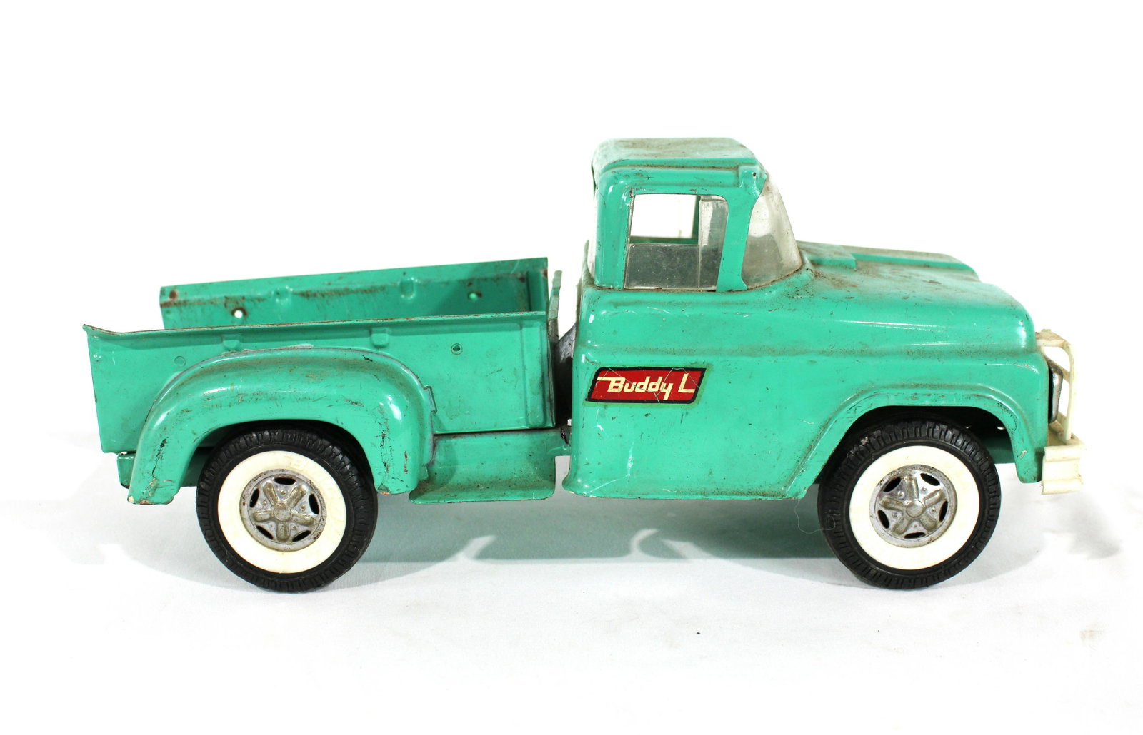 Buddy L Pressed Steel Truck: Buddy L Pressed Steel Truck. In-house shipping available. Dimensions: 5.5 x 5.5 x 13