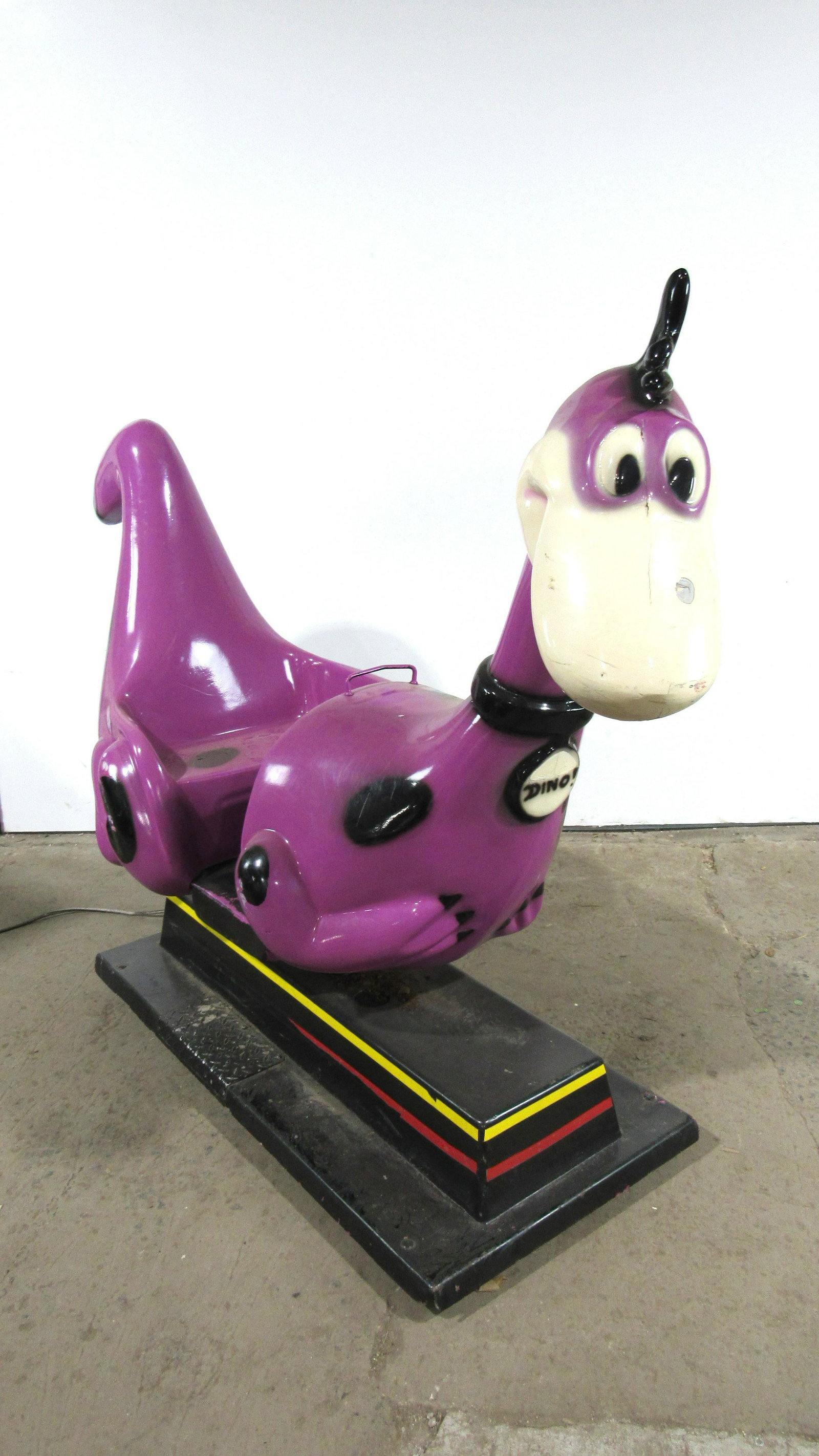 Flinstones Dino Coin Operated Kiddie Ride: Flinstones Dino Coin Operated Kiddie Ride, working with sound. This item requires third party shipping or pickup arrangements to be made. Dimensions: 58 x 29 x 75