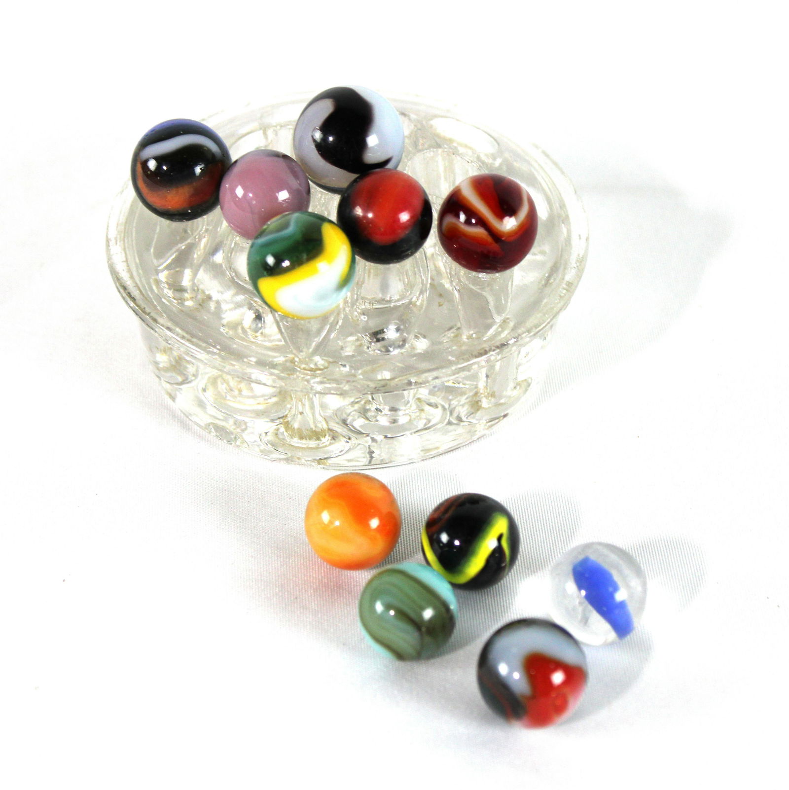 11 Hole Glass Flower Frog with Collectible Marbles: 11 Hole Glass Flower Frog with Collectible Marbles. All are NM to M. In-house shipping available.