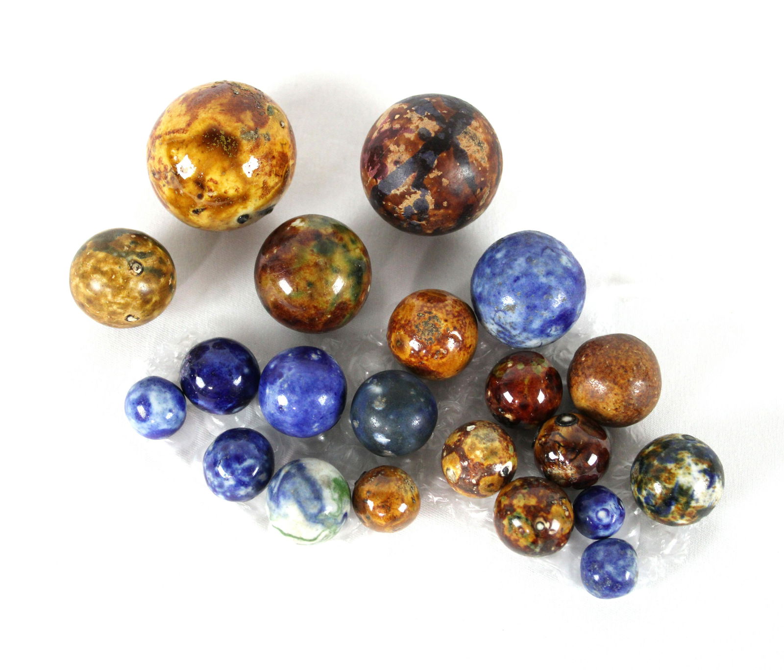 Lot of Bennington Marbles: Lot of Bennington Marbles. Largest is approx. 1 5/16". In-house shipping available.