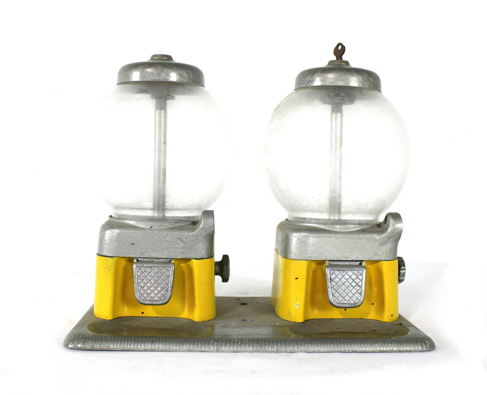 Abbey Mfg. Twin Coin Op Gumball Vendor: Abbey Mfg. Twin Coin Op Gumball Vendor. Has key, glass globes. This item requires third party shipping or pickup arrangements to be made. Dimensions: 11 x 14 x 8