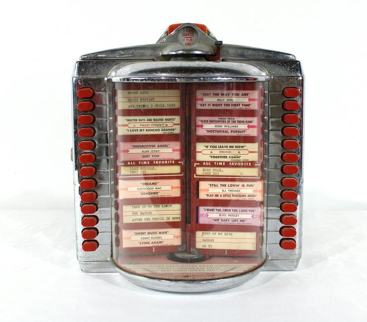 Wurlitzer Coin Operated Wallbox, 1950s: Wurlitzer Coin Operated Wallbox, 1950s. This item requires third party shipping or pickup arrangements to be made. Dimensions: 13 x 12 x 8