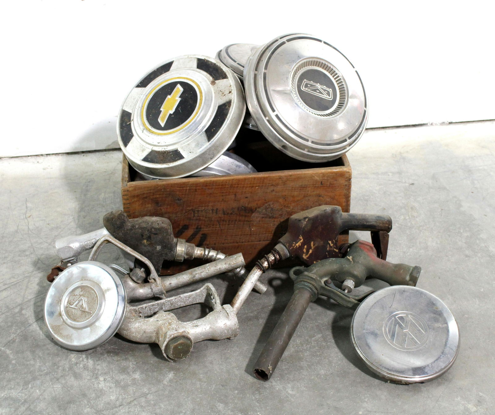 Assorted Hubcaps, Pump Nozzles and Explosives Crate (1 of 1)