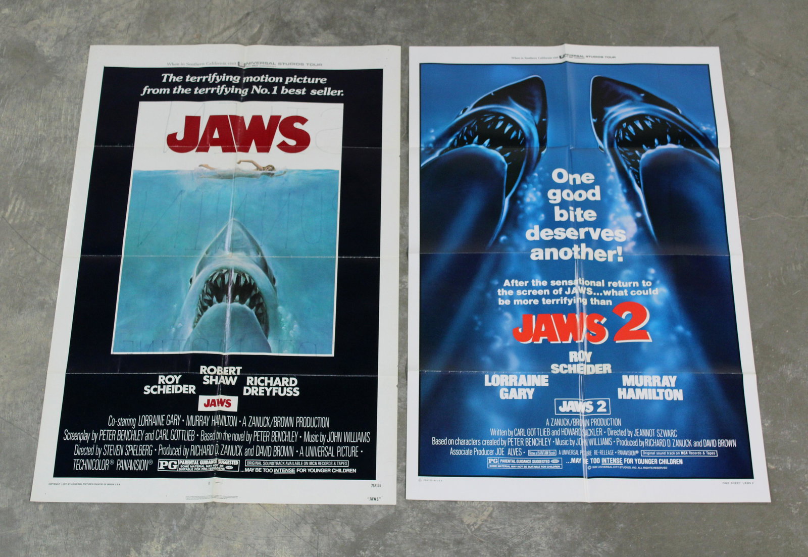 Jaws / Jaws II Movie Marquee Posters: Jaws / Jaws II Movie Marquee Posters. Jaws has writing on the back side. Ships flat. In-house shipping available. Dimensions: 41 x 26