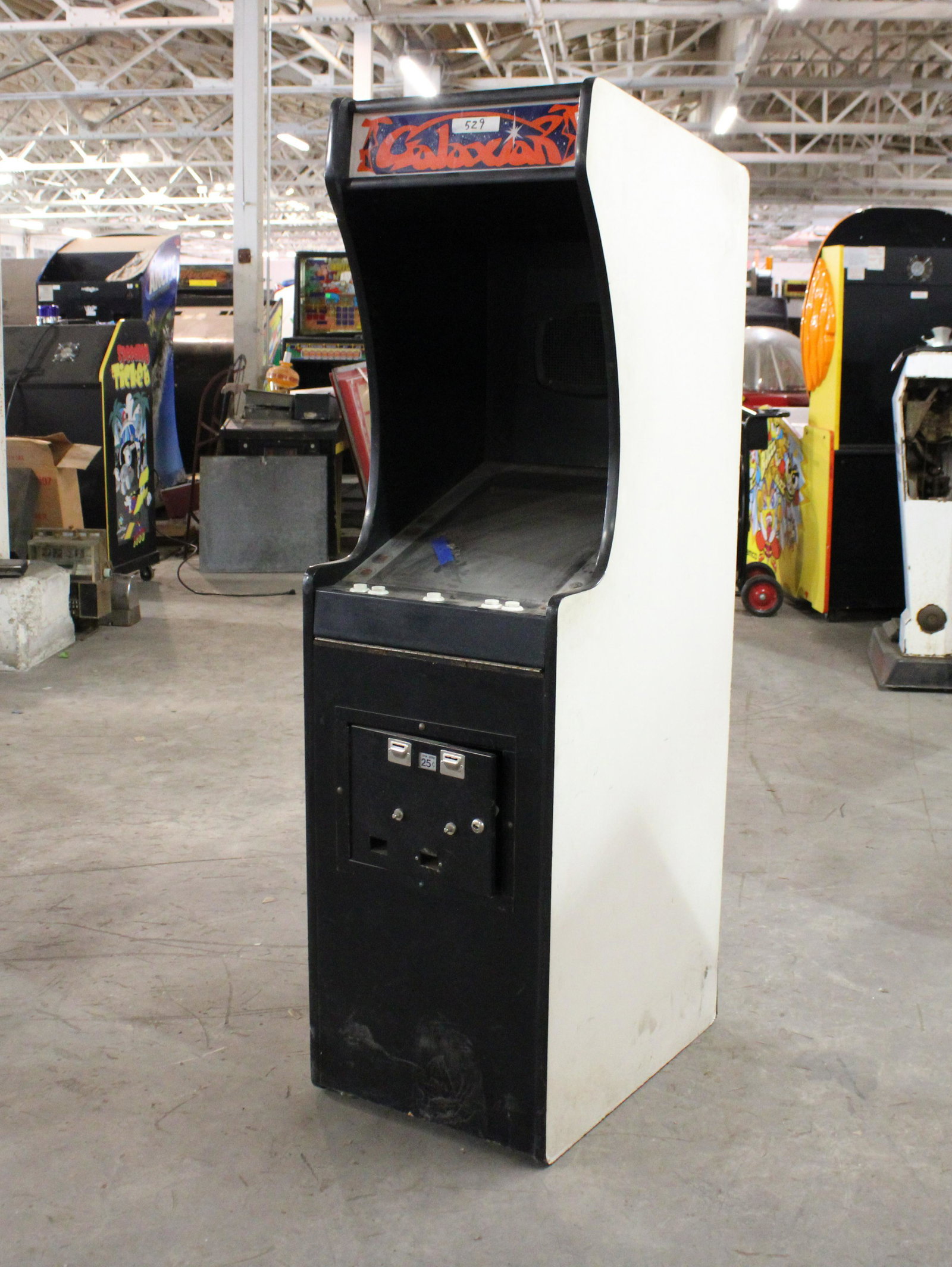 Galaxian Arcade Machine Serial #1001: Galaxian Arcade Machine Serial #1001. Foreign version, first one produced, as found.