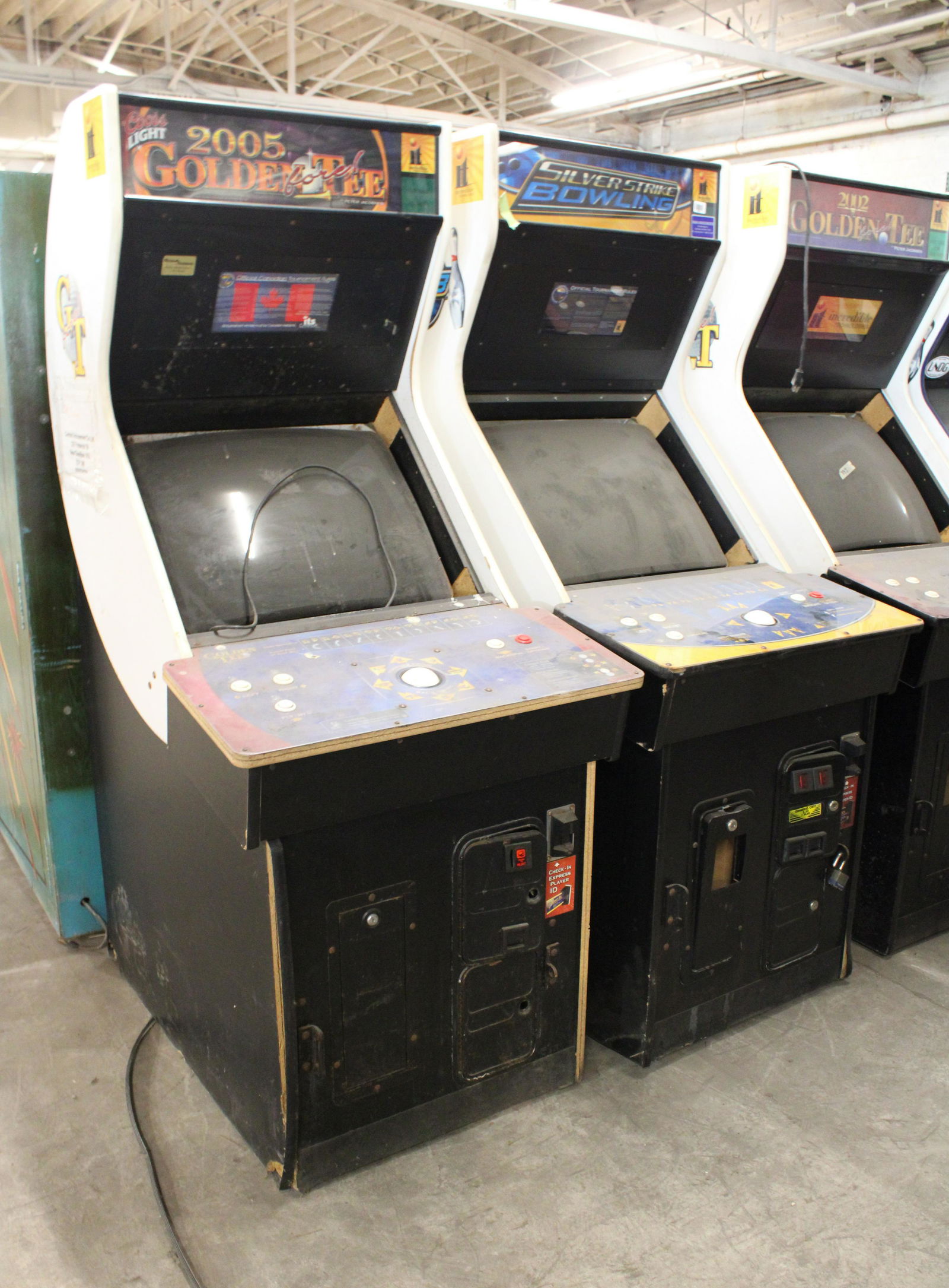 Golden Tee and Silver Strike Bowling Arcades (1 of 3)