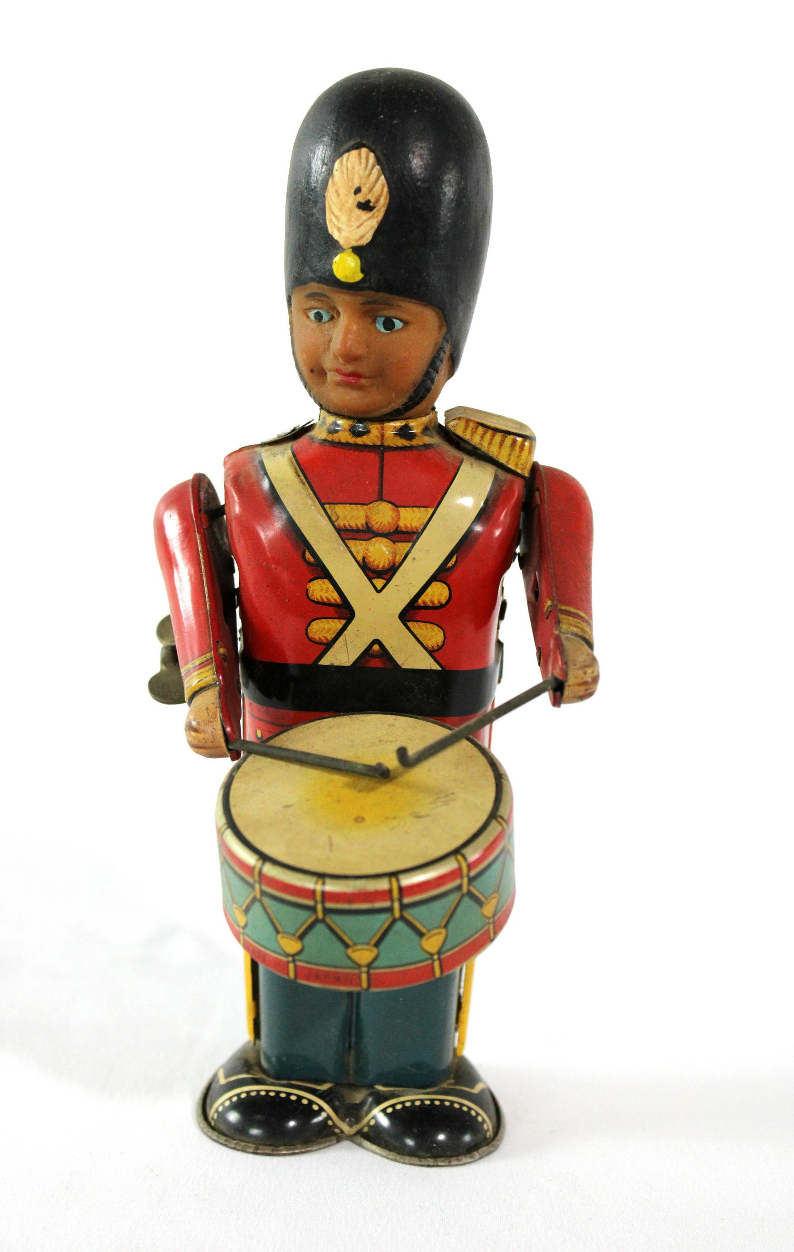 Tin Drummer Wind Up Toy, Japan: Tin Drummer Wind Up Toy, Japan. Celluloid Head. Right arm needs reattached. In-house shipping available. Dimensions: 8 x 3 x 4