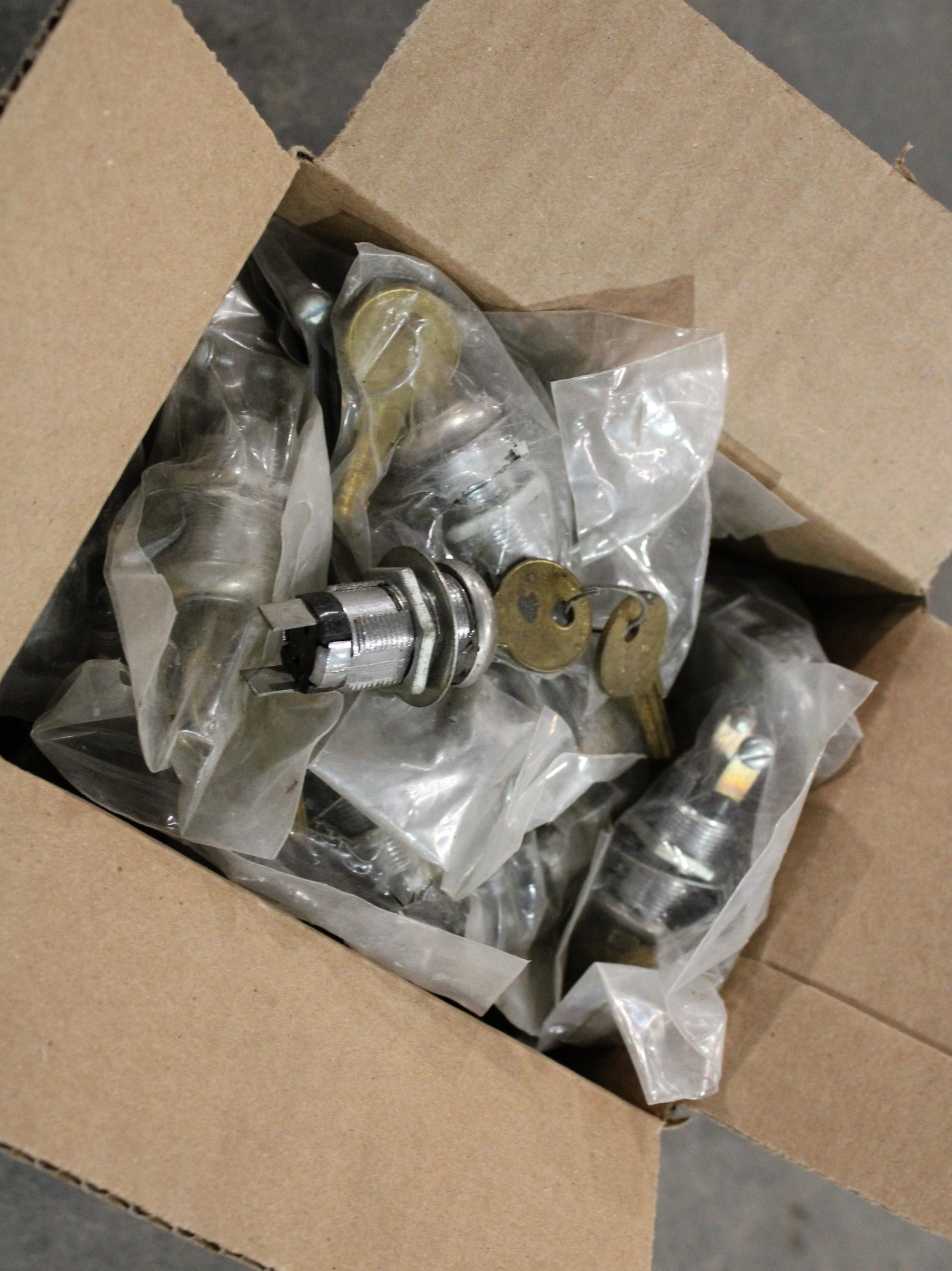 Large Lot of New Old Stock Arcade Game Locks: Large Lot of New Old Stock Arcade Game Locks. Box Size is 5 x 6 x 7.