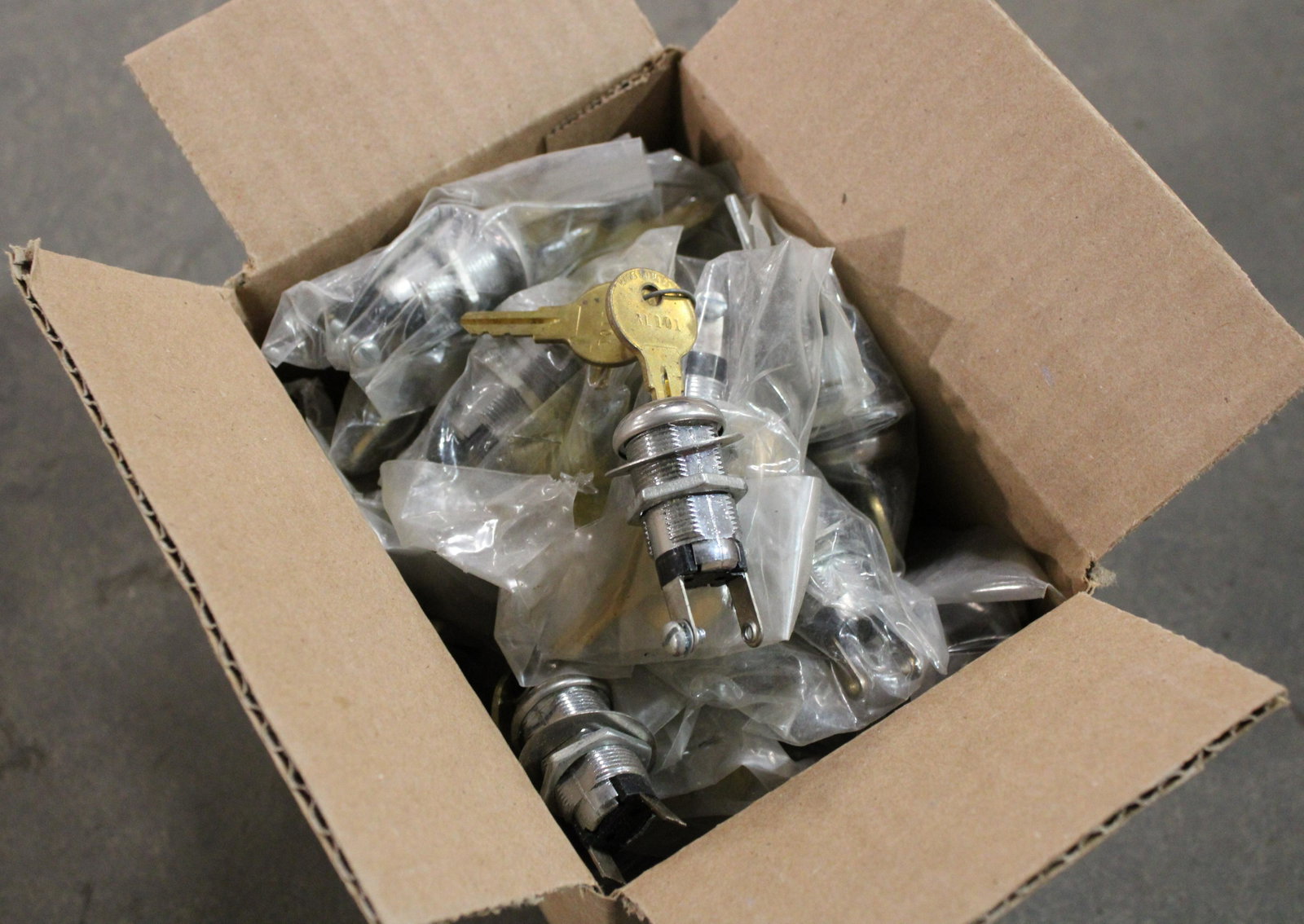 Large Lot of New Old Stock Arcade Game Locks: Large Lot of New Old Stock Arcade Game Locks. Box Size is 5 x 6 x 7.