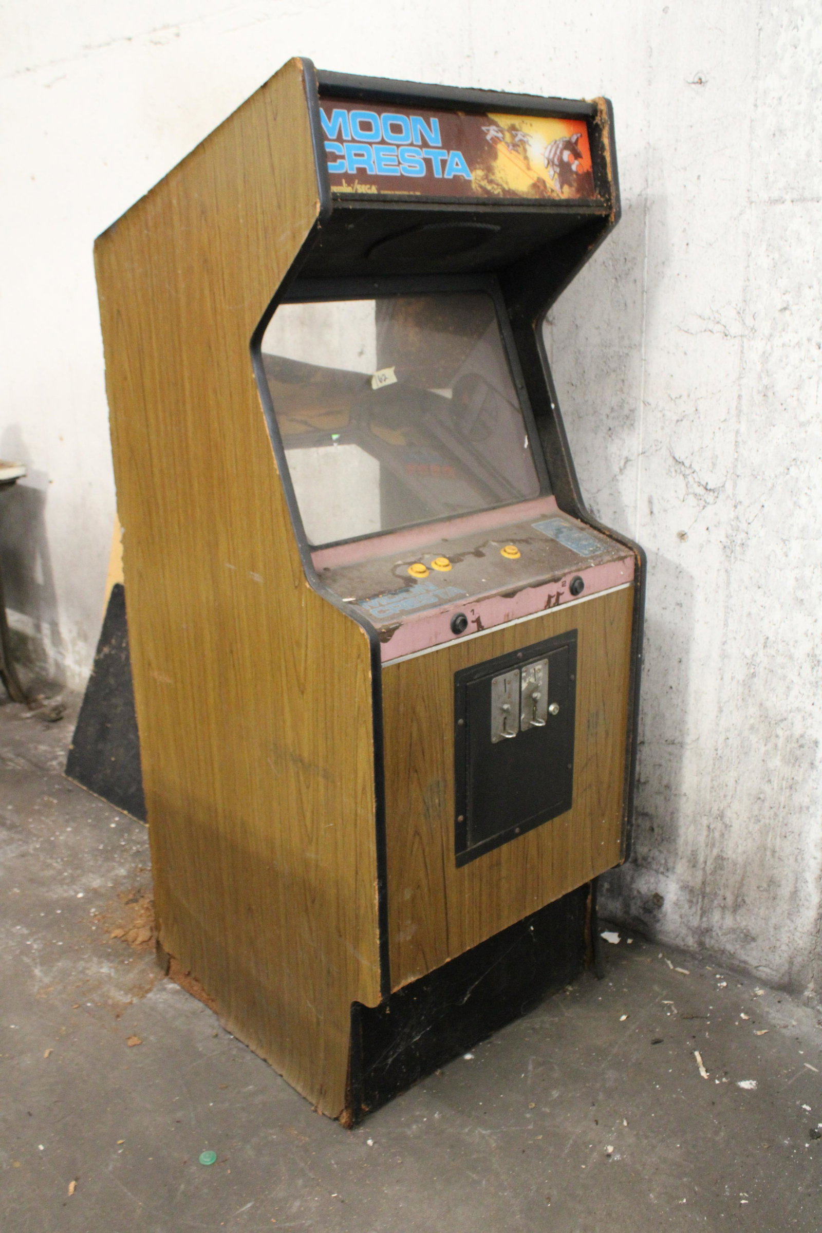 Sega Moon Cresta Arcade Cabinet with Board: Sega Moon Cresta Arcade Cabinet with Board. Cabinet damaged, for parts.