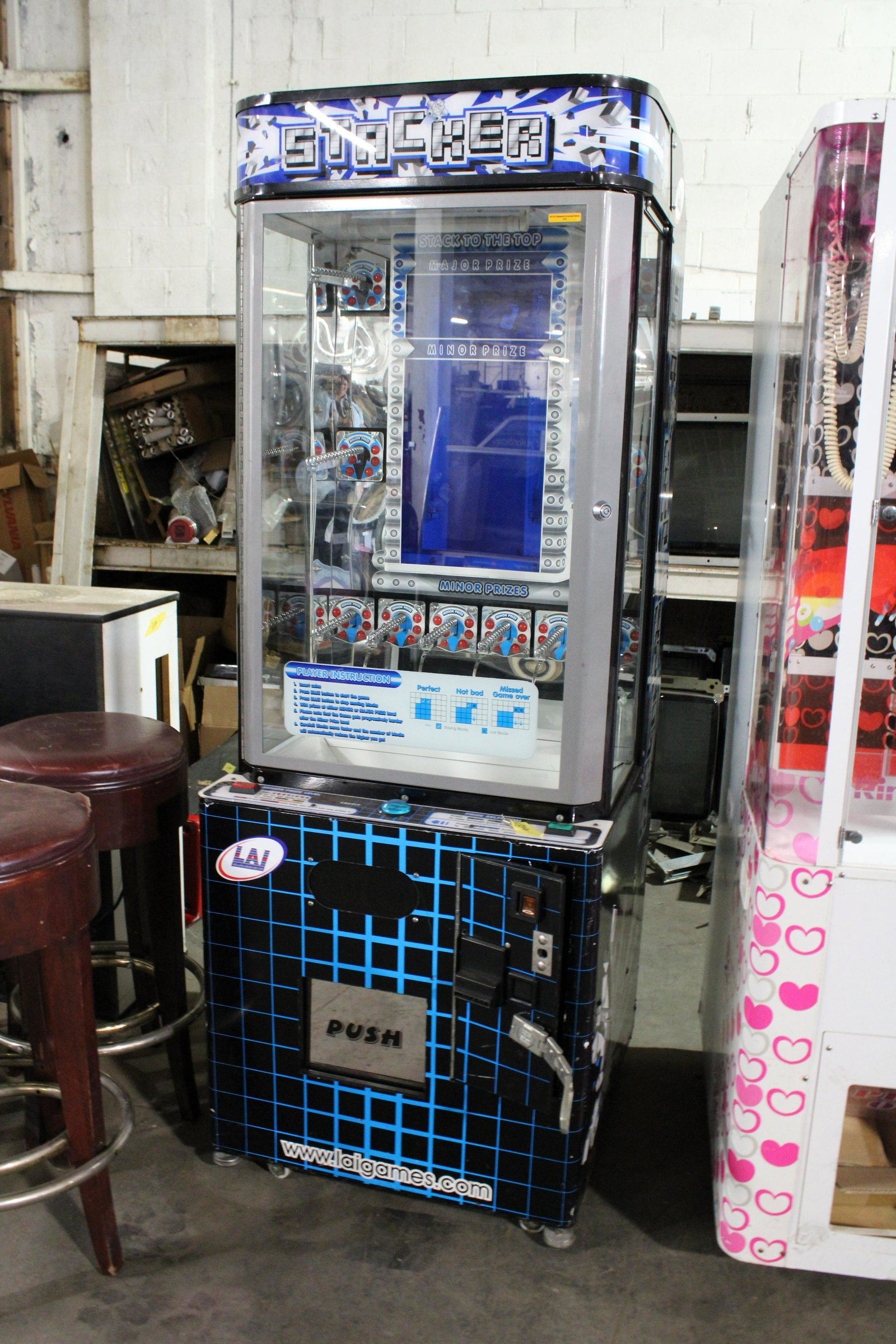 LAI Stacker Prize Arcade Game: LAI Stacker Prize Arcade Game. As found, untested.
