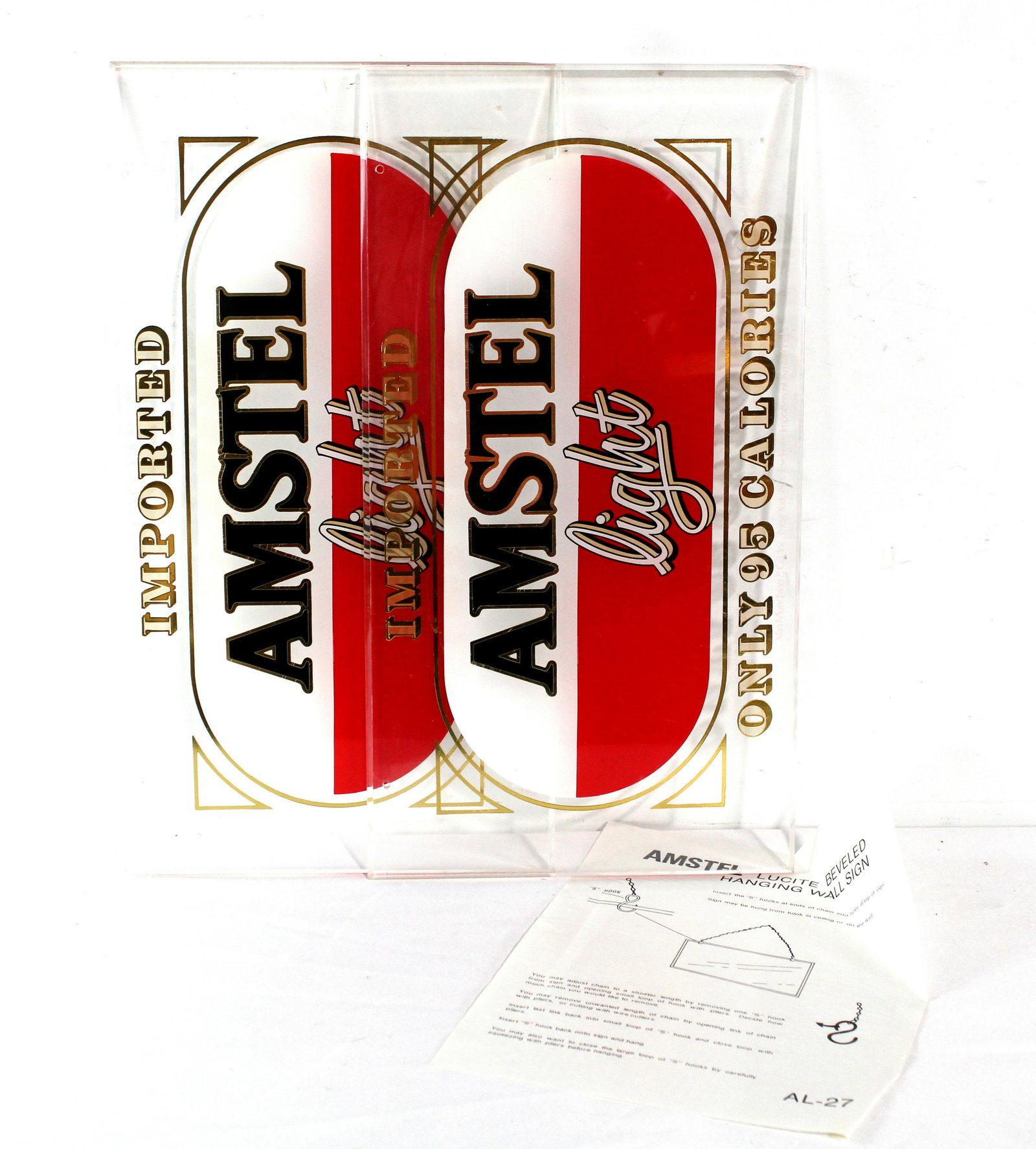NOS Amstel Light Lucite Hanging Signs: NOS Amstel Light Lucite Hanging Signs. Hooks / Chain not included. Dimensions: 10 x 18 x 2. *Shipping now available via Live Shipping through Live Auctioneers. Please see terms for more details.