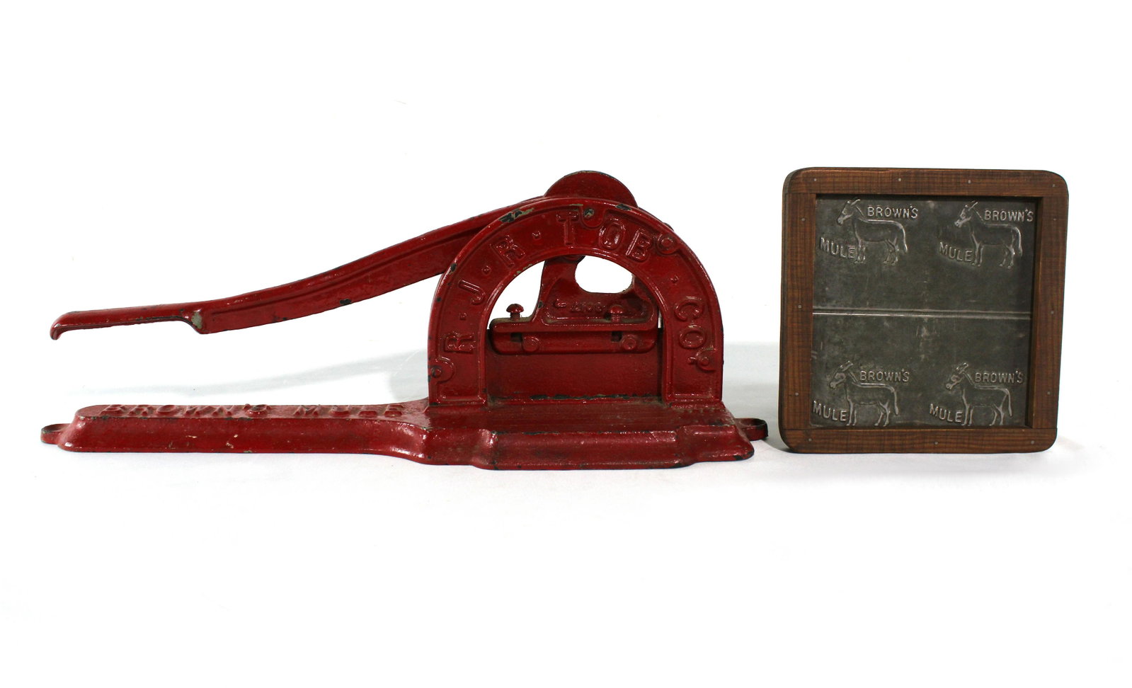 Browns Mule Tobacco Cutter with Tin Plaque, Early 1900s: Browns Mule Cigar Tobacco Cutter with Tin Plaque, Early 1900s. Dimensions of Cutter: 7 x 19 x 5. *Shipping now available via Live Shipping through Live Auctioneers. Please see terms for more details.