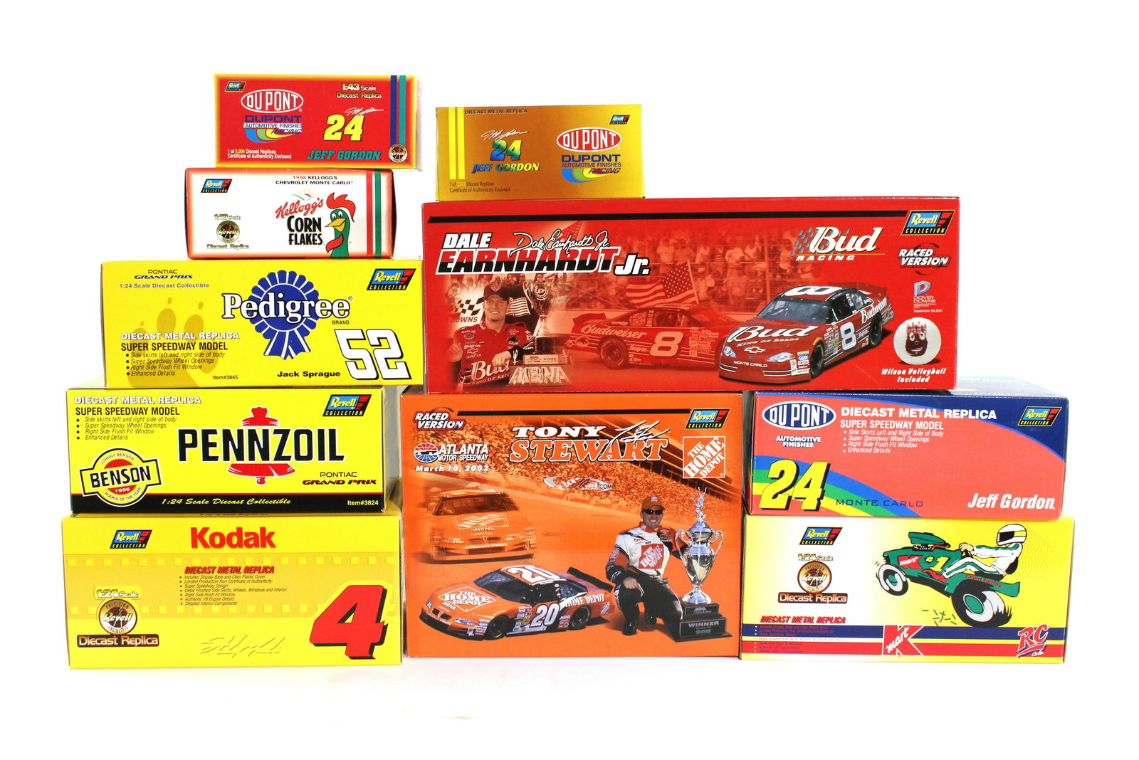 NIB NASCAR Diecast Replicas by Revell, incl. Dale Earnhardt Jr.: NIB NASCAR Diecast Replicas by Revell, incl. Dale Earnhardt Jr. and Jeff Gordon. Varying sizes, all are new in box. Total of 10 Cars. Dimensions of Largest: 7 x 18 x 7. *Shipping now available via Liv