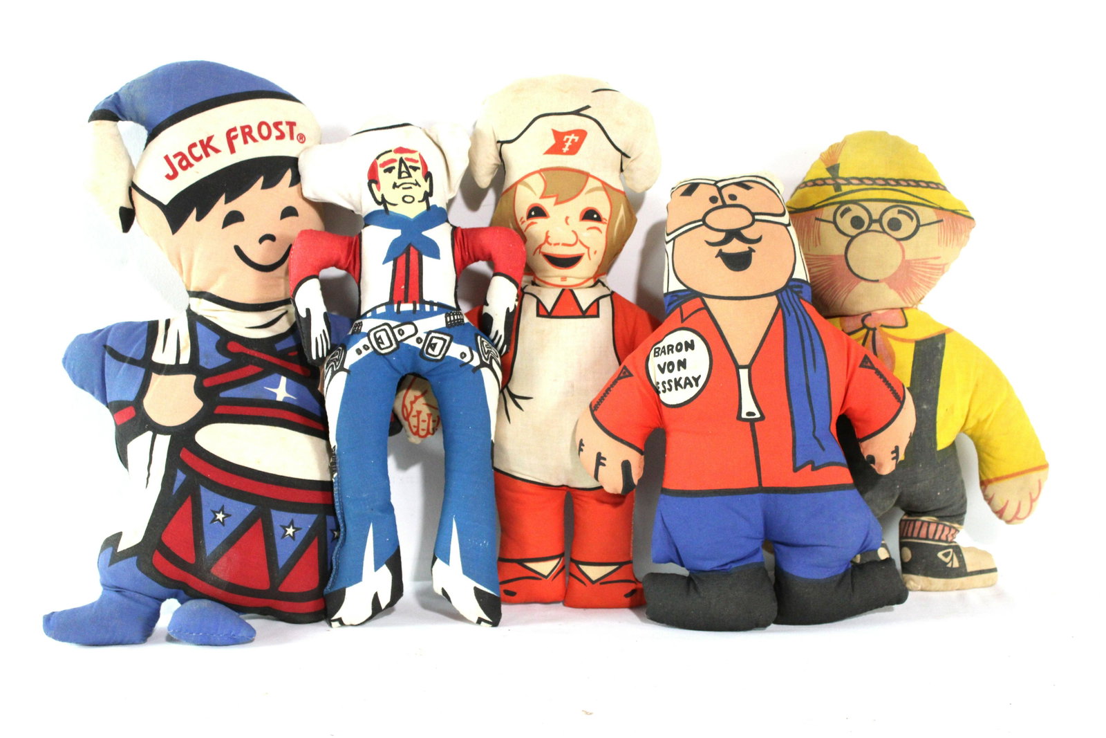 Vintage Advertising Plush Dolls incl. Baron Von Eskay: Vintage Advertising Plush Dolls incl. Baron Von Eskay, Little Hans Nestle Chocolate Maker, Jack Frost, IGA The Table Rite Kid, and The Tasty Cakes Chef. Dimensions of One: 15 x 8 x 1. *Shipping now av