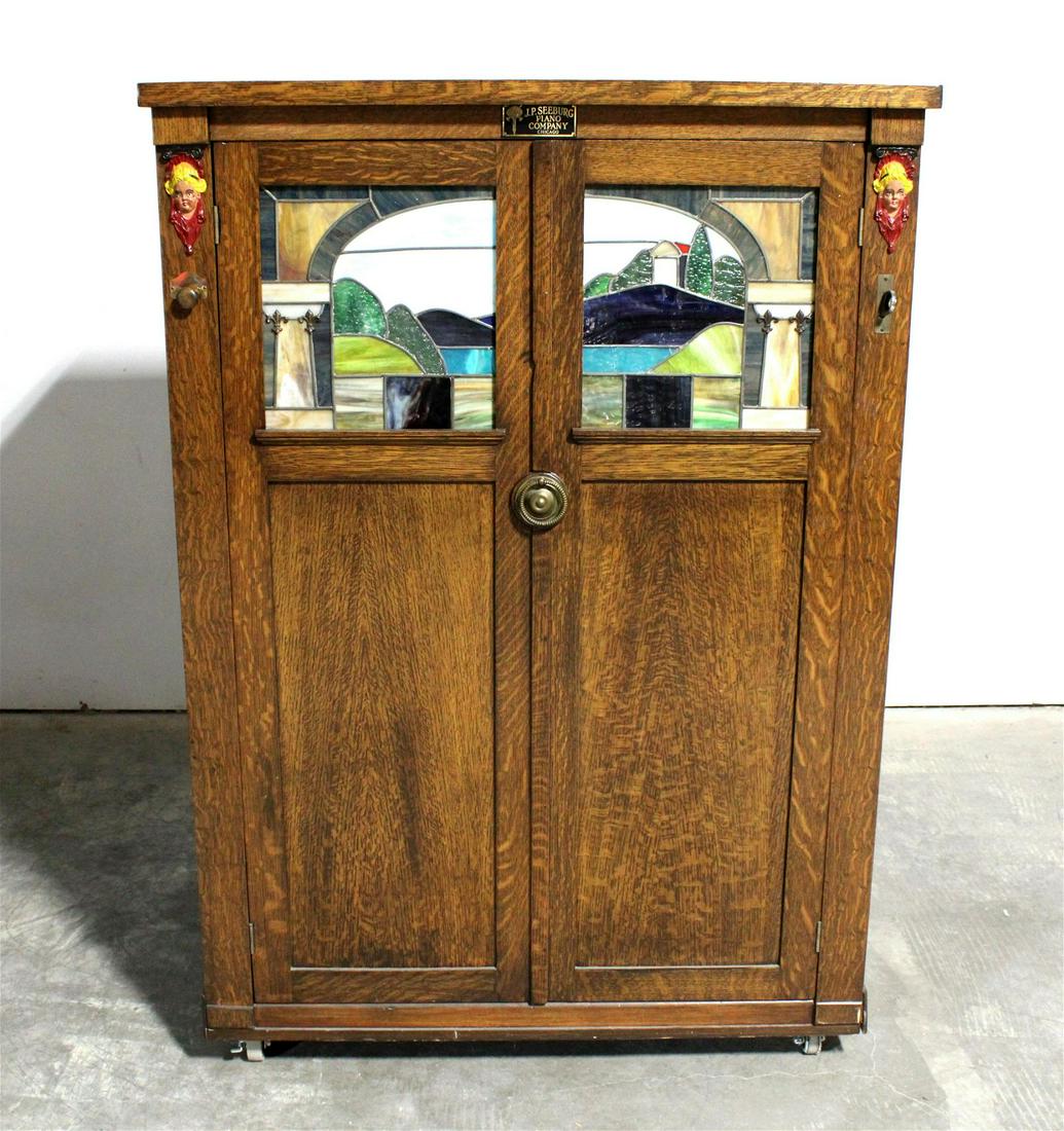 J.P. Seeburg Style L Coin Operated Nickelodeon Player Piano: J.P. Seeburg Style L Coin Operated Nickelodeon Player Piano. Dimensions: 53 x 37 x 24. *Please see terms for shipping details.