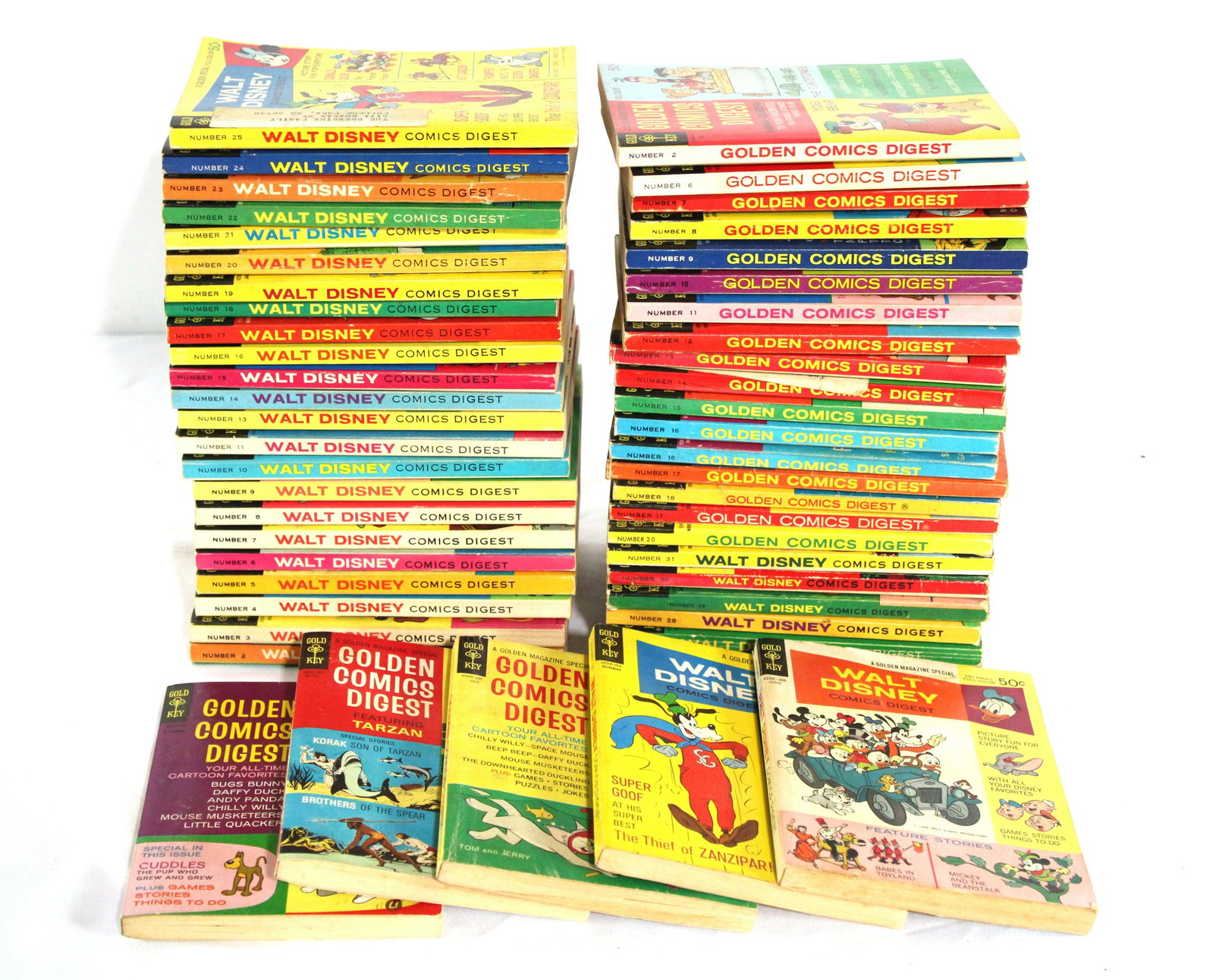 Walt Disney and Golden Comics Digest Magazines, 1960s-70s: Walt Disney and Golden Comics Digest Magazines, 1960s-70s. Dimensions of stack together: 12 x 14 x 5. *Please see terms for shipping details.