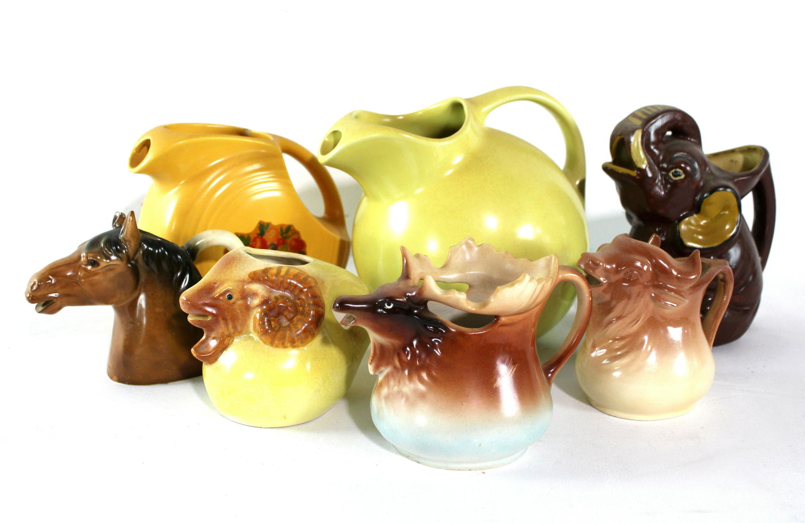 Vintage Jugs incl. Hall and Fiestaware: Vintage Jugs incl. Hall and Fiestaware. Dimensions of Hall Jug: 7 x 8 x 6. *Please see terms for shipping details.