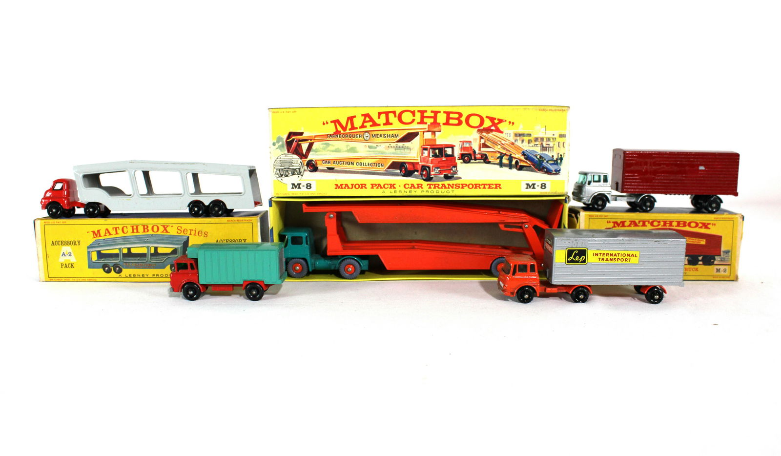 Matchbox Trucks incl. M-8, M-2 and A-2: Matchbox Trucks incl. M-8, M-2 and A-2. Some in original boxes. Dimensions of M-8 Car Transporter: 3 x 9 x 1. *Please see terms for shipping details.