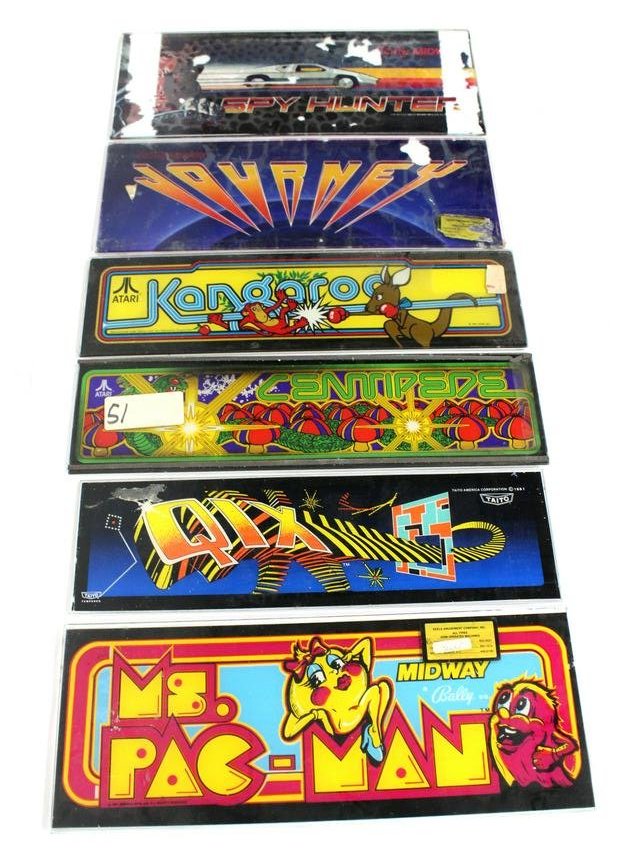 Glass Arcade Game Headers incl. Centipede and Qix: Glass Arcade Game Headers incl. Centipede and Qix. Local pickup only. Dimensions: 7 x 21. *Please see terms for shipping details.
