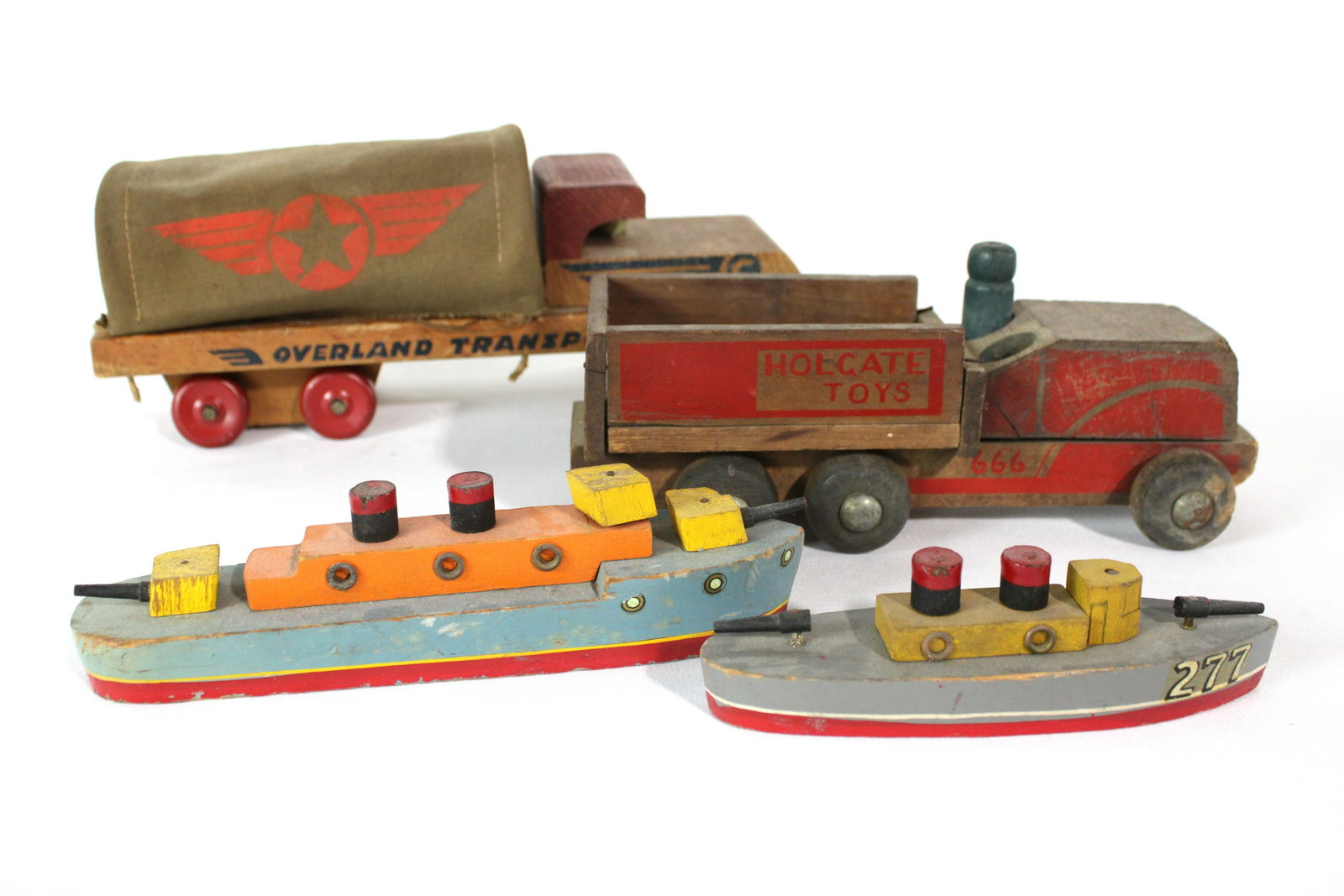 WW2 Wooden Trucks and Boat Toys: WW2 Wooden Trucks and Boat Toys. In-house shipping available. Dimensions of largest: 5 x 4 x 11