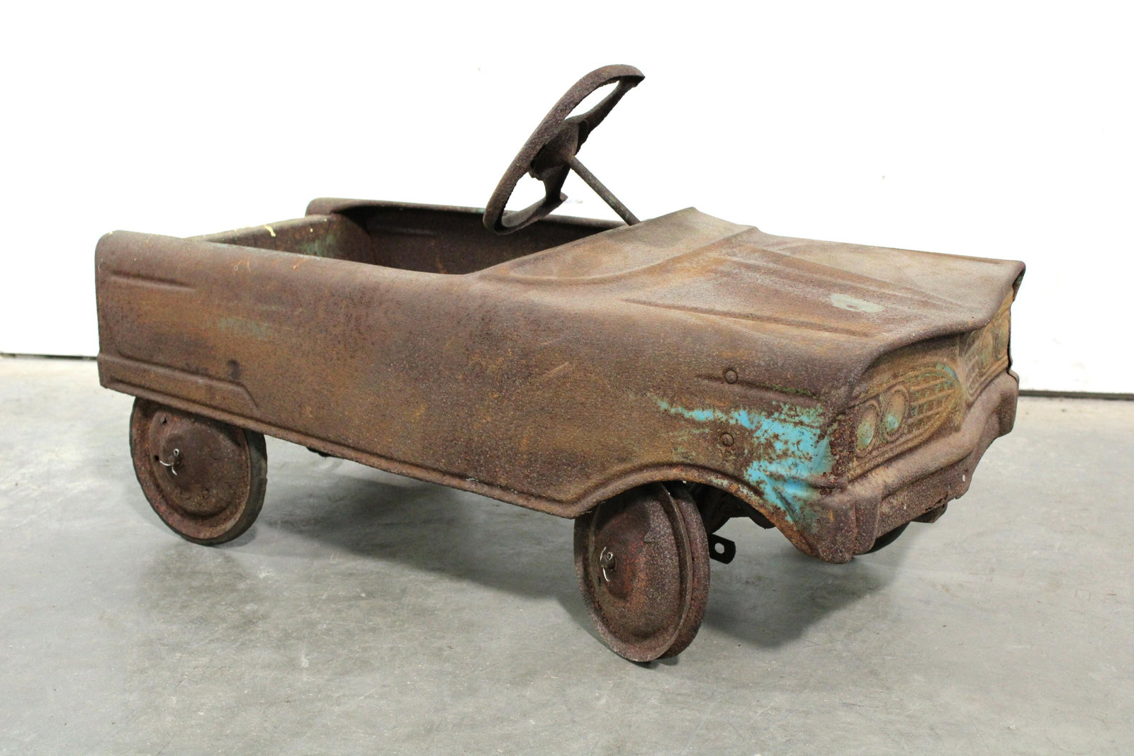 Kiddie Pedal Car Cadillac: Kiddie Pedal Car Cadillac. This item requires third party shipping or pickup arrangements to be made. Dimensions: 17 x 15 x 34