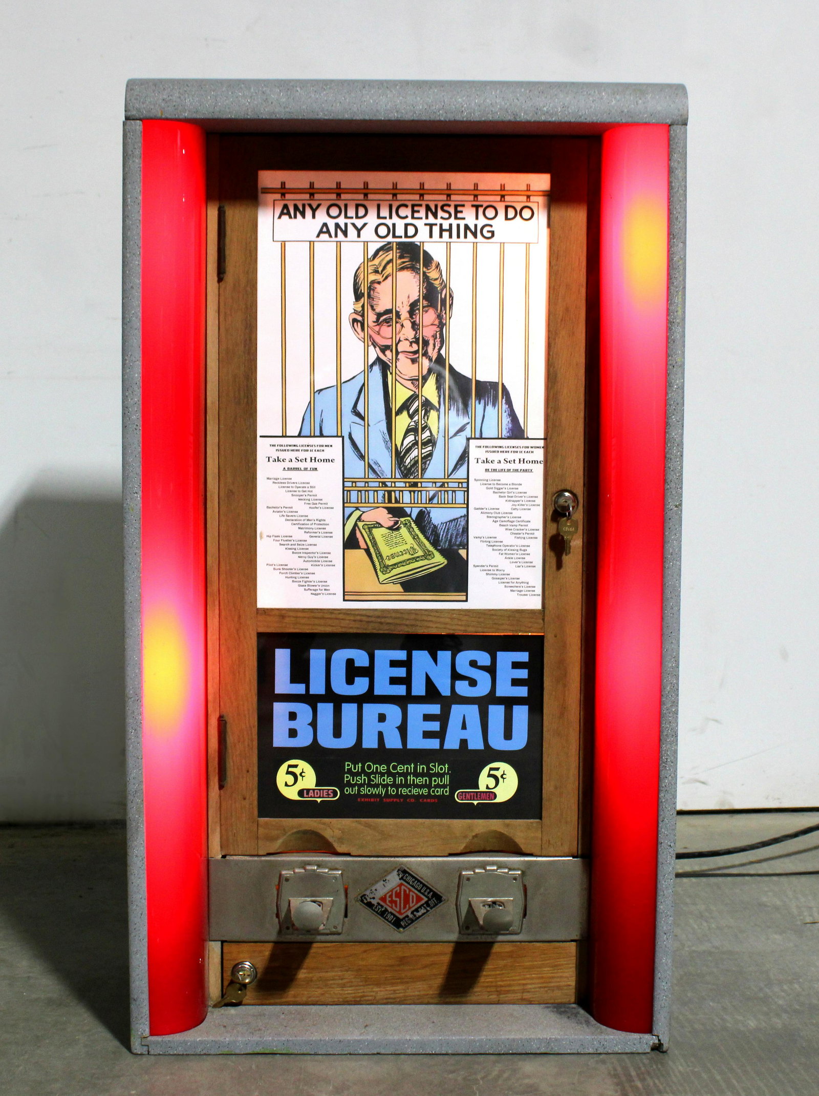 Exhibit Supply License Bureau Coin Operated Arcade: Exhibit Supply License Bureau Coin Operated Arcade. Includes approx. 100 cards to vend. This item requires third party shipping or pickup arrangements to be made. Dimensions: 39 x 22 x 13