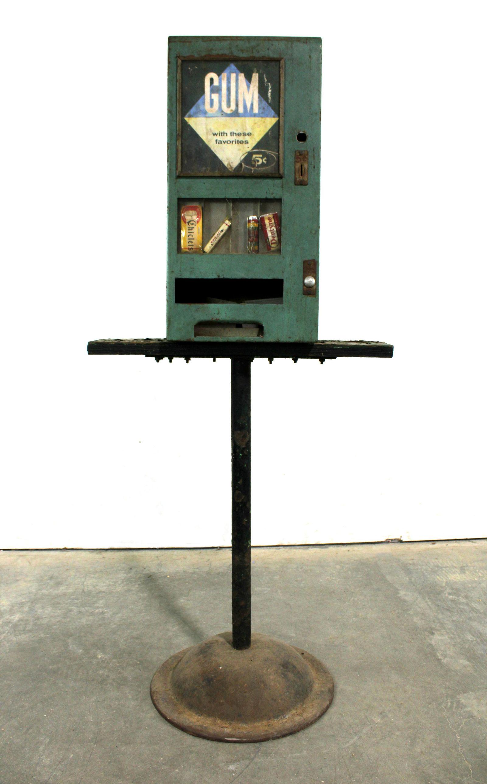 Coin Op Gum Vendor on Stand: Coin Op Gum Vendor on Stand. Missing parts. This item requires third party shipping or pickup arrangements to be made. Dimensions on stand: 56 x 25 x 17