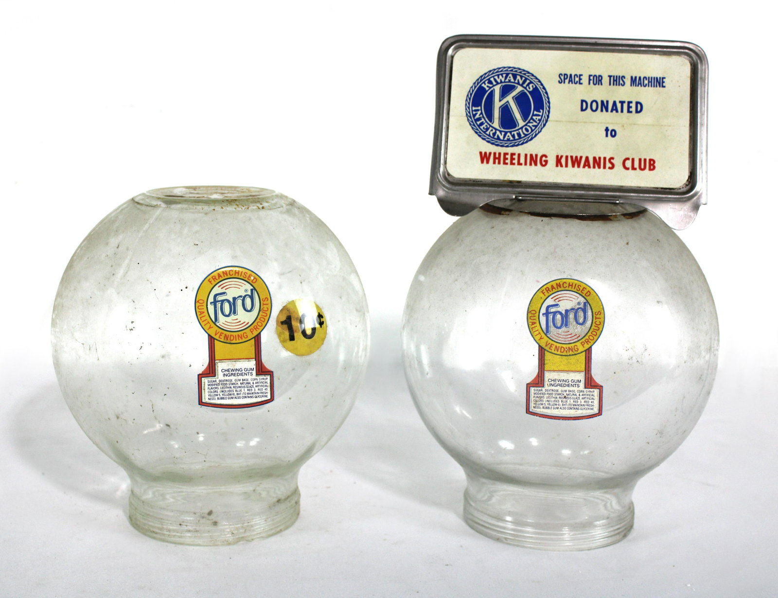 Pair of Ford Gumball Globes: Pair of Ford Gumball Globes. This item requires third party shipping or pickup arrangements to be made. Dimensions of One: 8 x 8 x 8