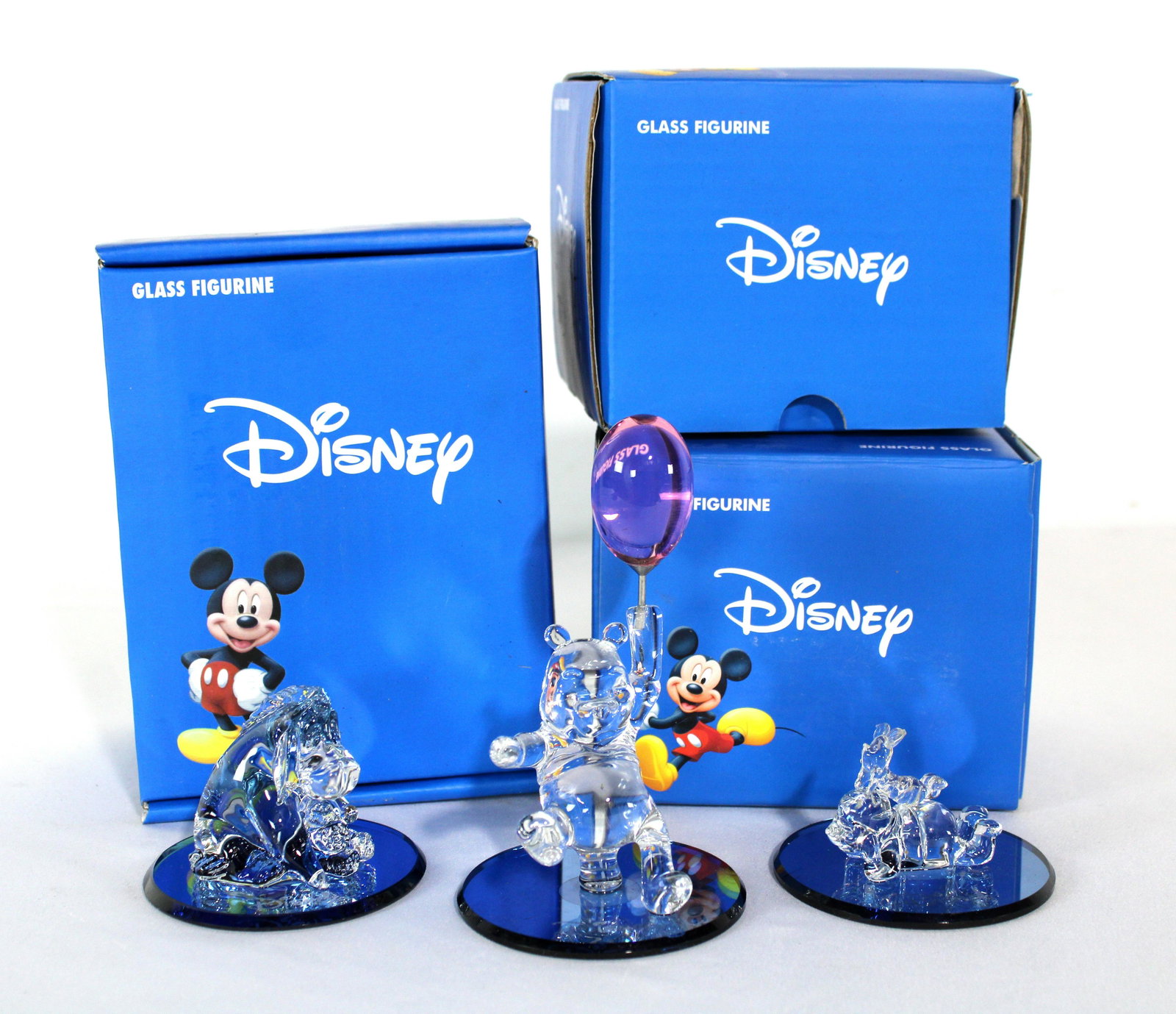 Disney Glass Figurines incl. Winnie the Pooh: Disney Glass Figurines incl. Winnie the Pooh. Total of Three. In-house shipping available. Dimensions of One:5 x 3 x 3