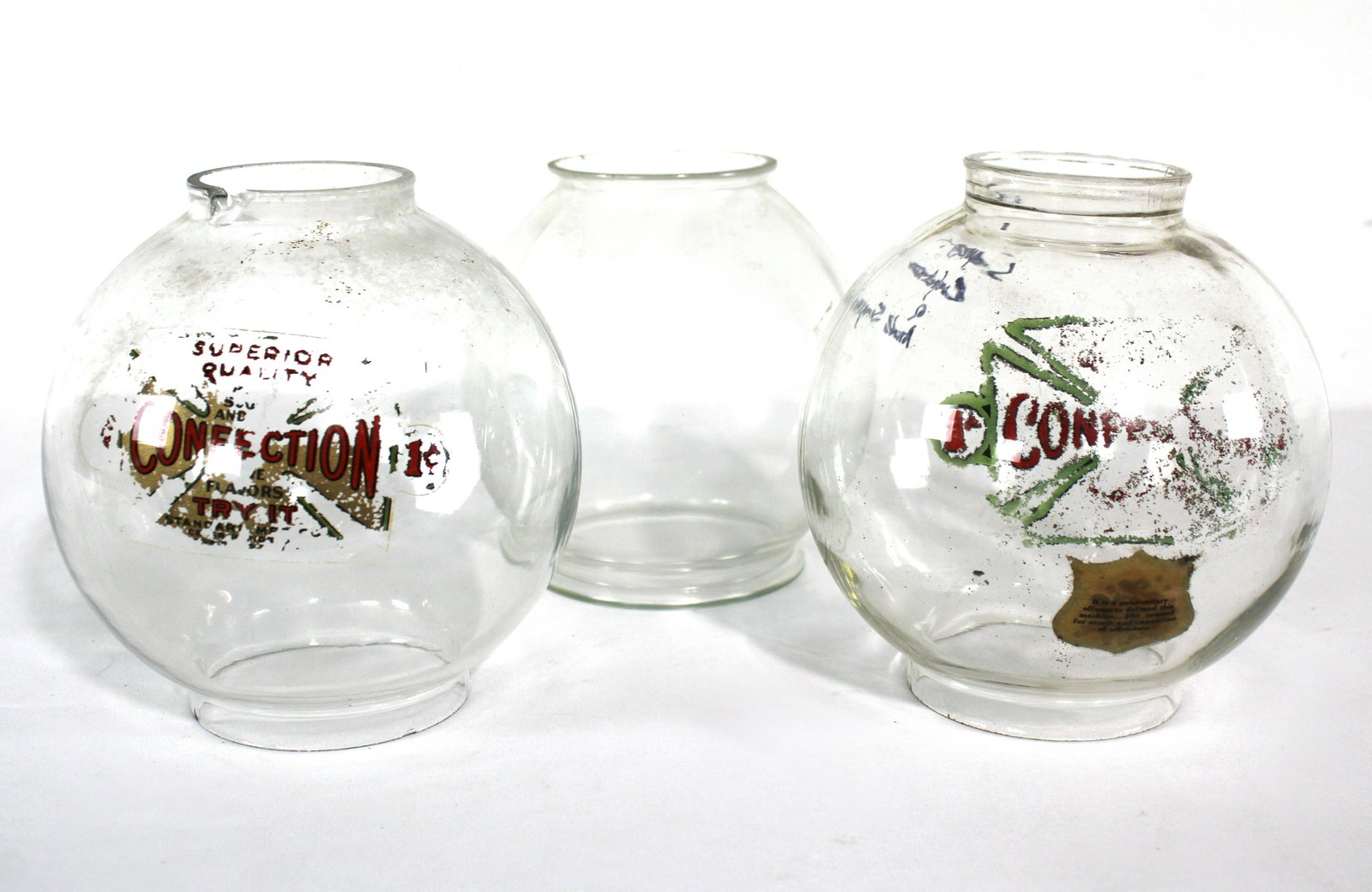Glass Gumball Globes incl. Standard Mfg. Globe: Glass Gumball Globes incl. Standard Mfg. Globe. Total of Three. Rim chip on one. This item requires third party shipping or pickup arrangements to be made. Dimensions of One: 8 x 8 x 8