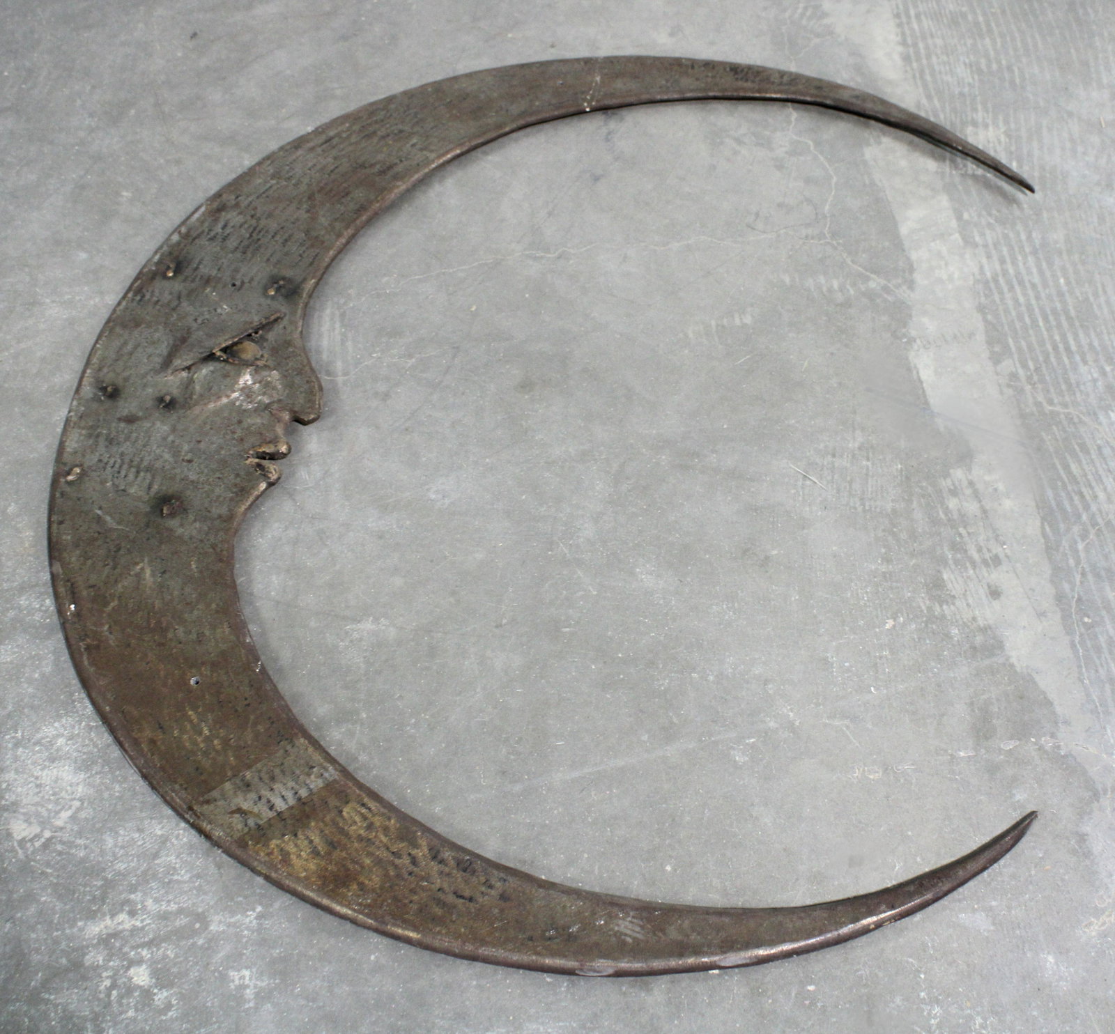 Large Metal Moon Sculpture: Large Metal Moon Sculpture. HEAVY! This item requires third party shipping or pickup arrangements to be made. Dimensions: 44 x 41 x 2