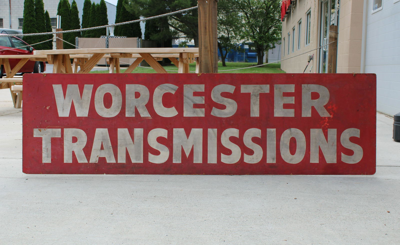 6.5FT Worcester Transmissions Masonite Sign: 6.5FT Worcester Transmissions Masonite Sign. This item requires third-party shipping or pickup arrangements to be made. Dimensions: 23 x 78