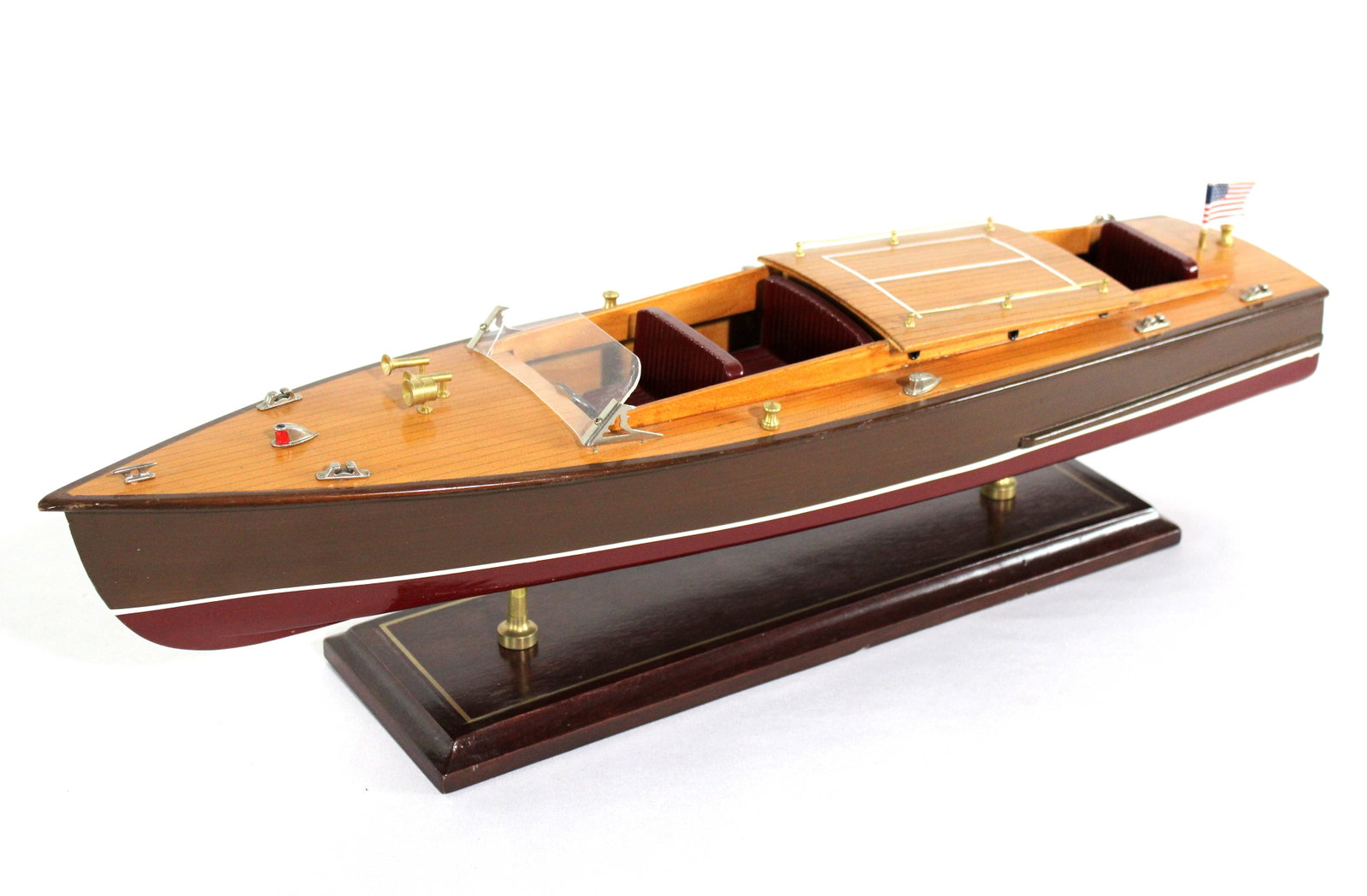 24" Triple Cockpit Wooden Boat Model: 24" Triple Cockpit Wooden Boat Model. This item requires third-party shipping or pickup arrangements to be made. Dimensions: 7 x 7 x 24