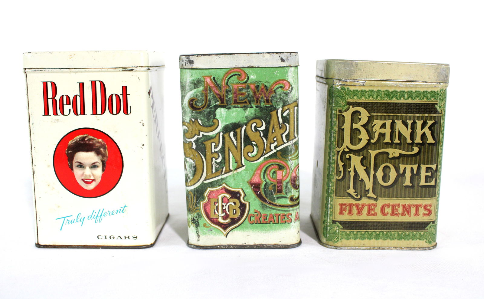 Red Dot, New Sensation and Bank Note Tobacco Tins: Red Dot, New Sensation and Bank Note Tobacco Tins, 1930s. In-house shipping available. Dimensions of One: 5 x 4 x 4