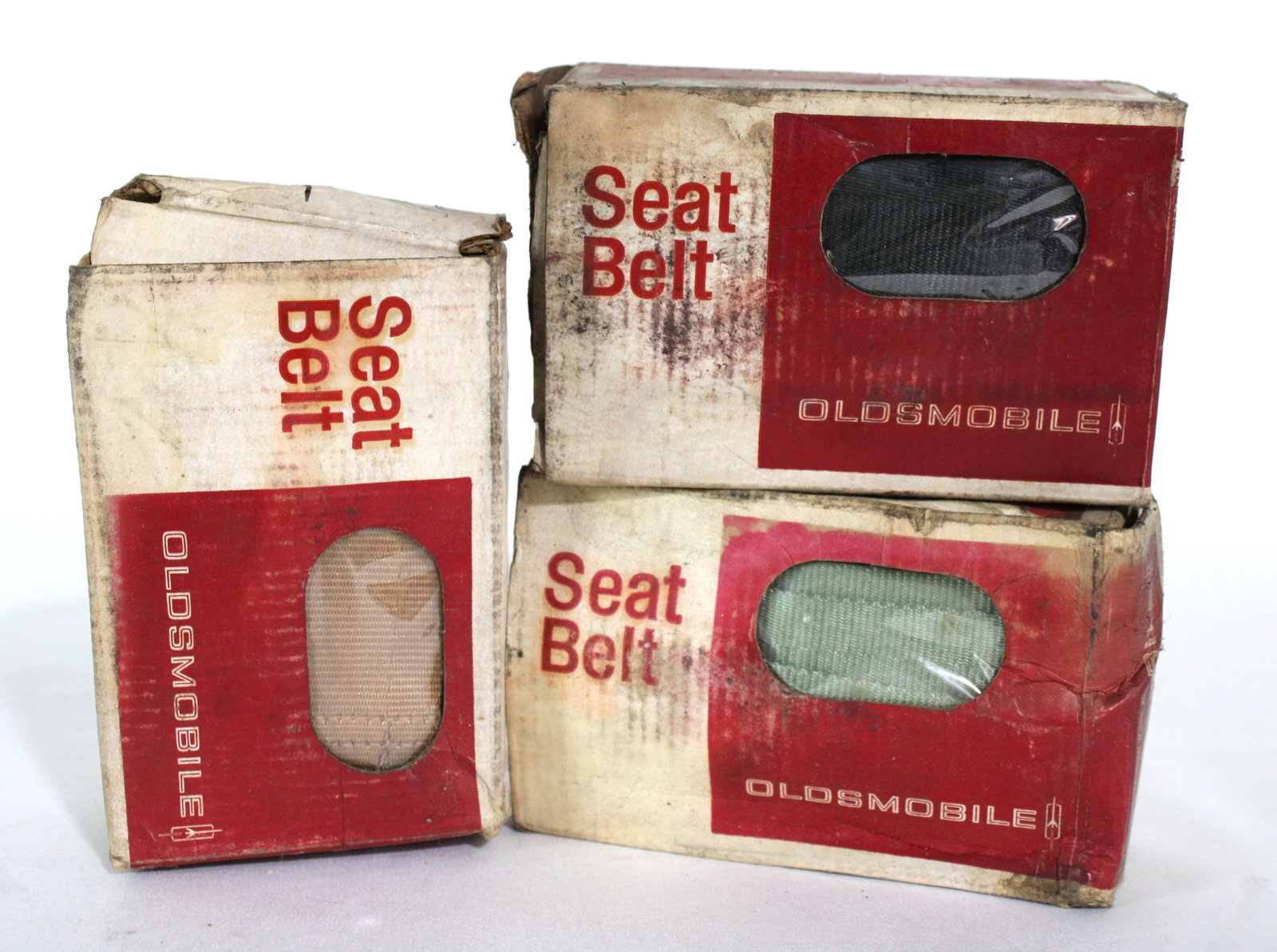 NOS Oldsmobile Seatbelts, Varying Colors, 1960s: NOS Oldsmobile Seatbelts, Varying Colors, 1960s. In-house shipping available. Dimensions of One Box: 4 x 6 x 2