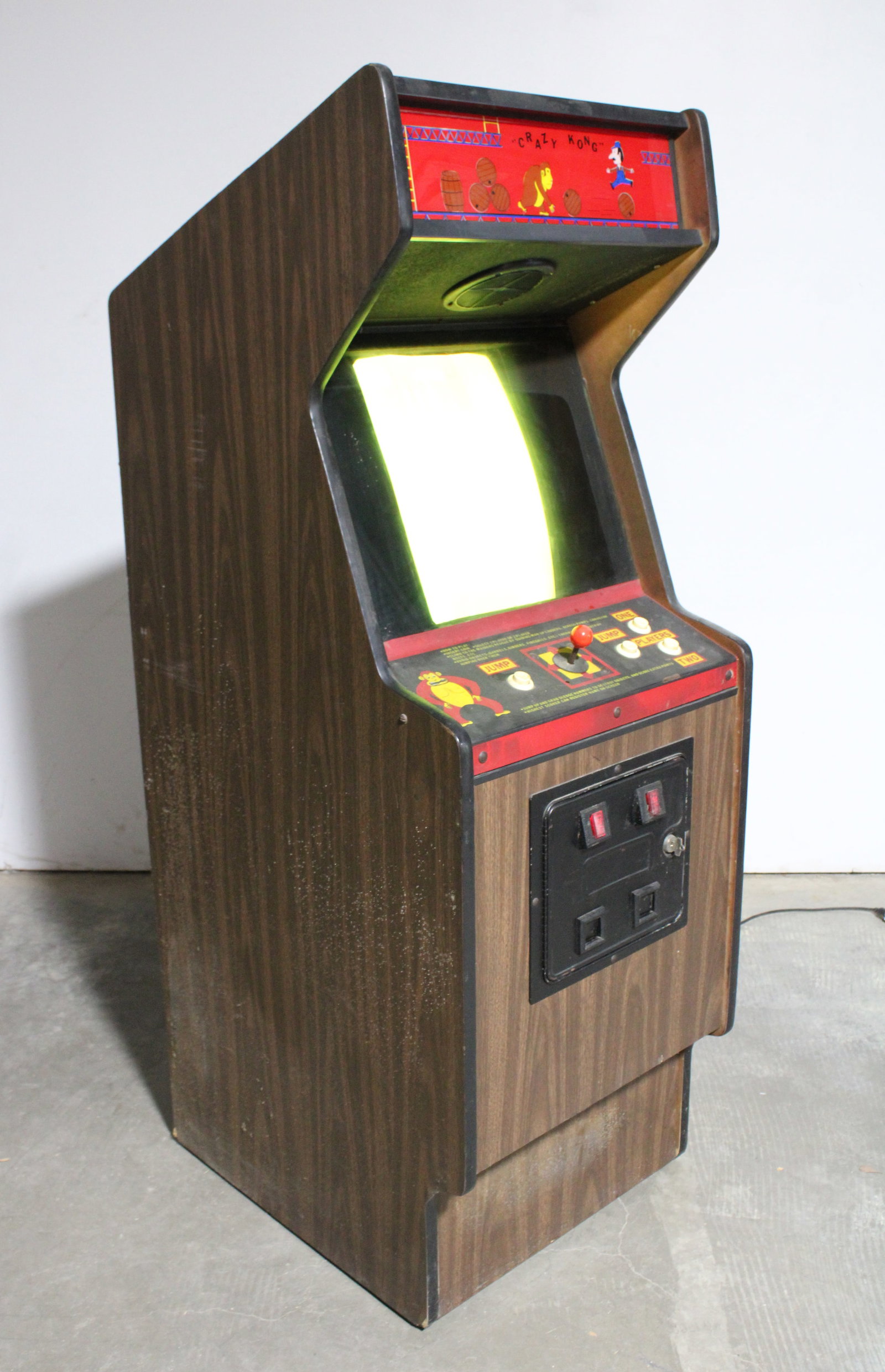 Crazy Kong, Aftermarket Donkey Kong Arcade Game: Crazy Kong, Aftermarket Donkey Kong Arcade Game. Working but monitor needs repaired (see photos). This item requires third-party shipping or pickup arrangements to be made. Dimensions: 67 x 24 x 30