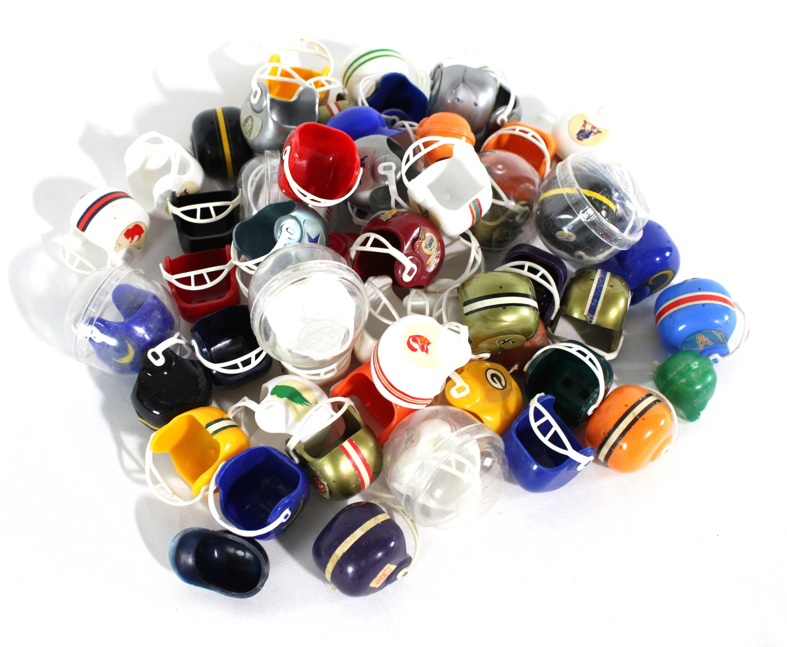 NFL Football Collector Mini Helmets, 1980s: NFL Football Collector Mini Helmets, 1980s. In-house shipping available. Dimensions of One: 1 x 2