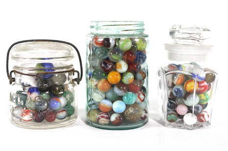 Assorted Marbles in Jars: Assorted Marbles in Jars. In-house shipping available without jars. Dimensions of Largest: 5 x 3 x 3