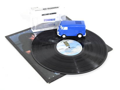 "Record Runner" Portable Mini Record Player with Album: "Record Runner" Portable Mini Record Player with Album. 33 1/2 rpm - New, working with batteries. In-house shipping available.