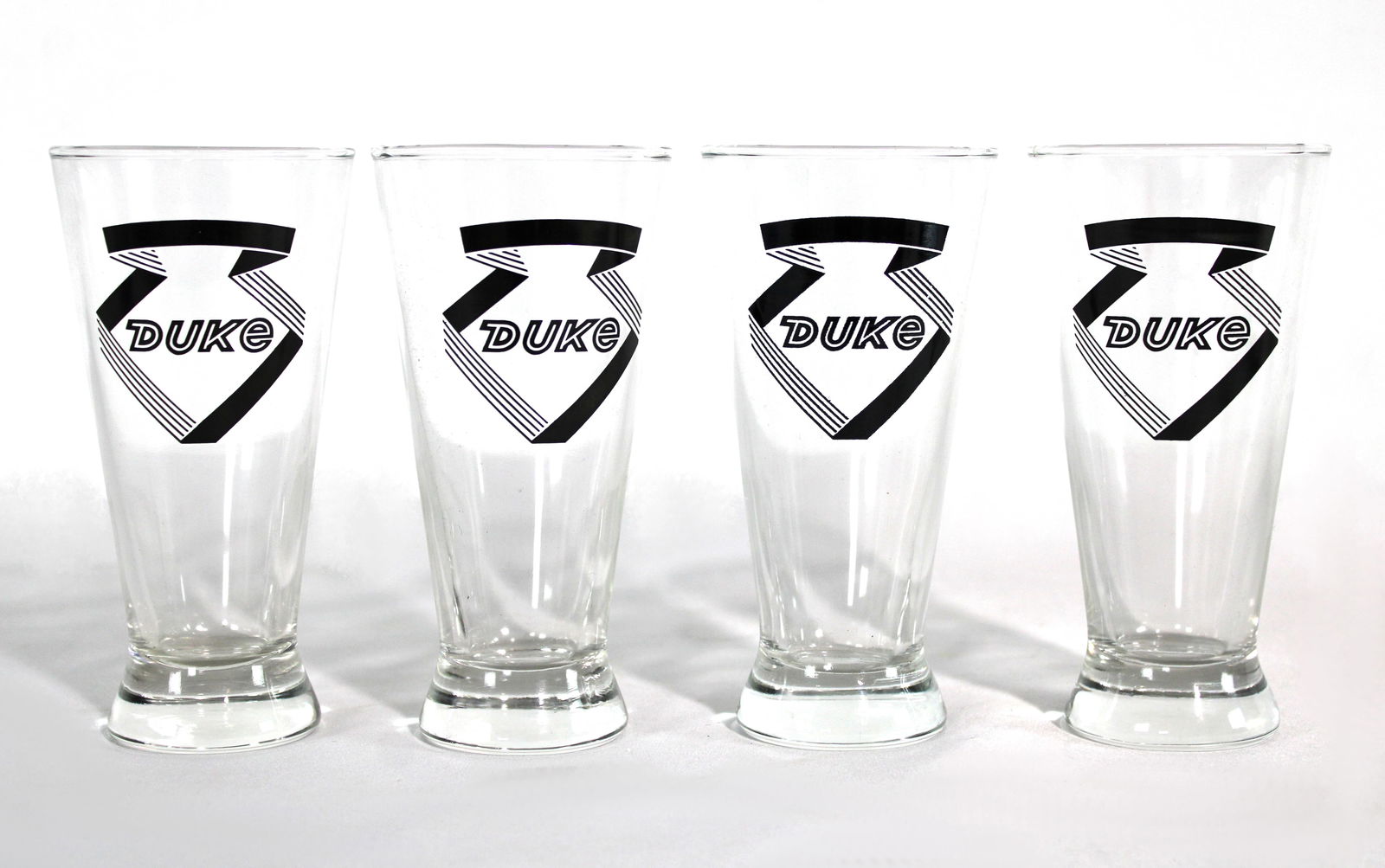 Duke Beer Glasses: This item requires third-party shipping or pickup arrangements to be made. Dimensions of one: 6 x 3 x 3