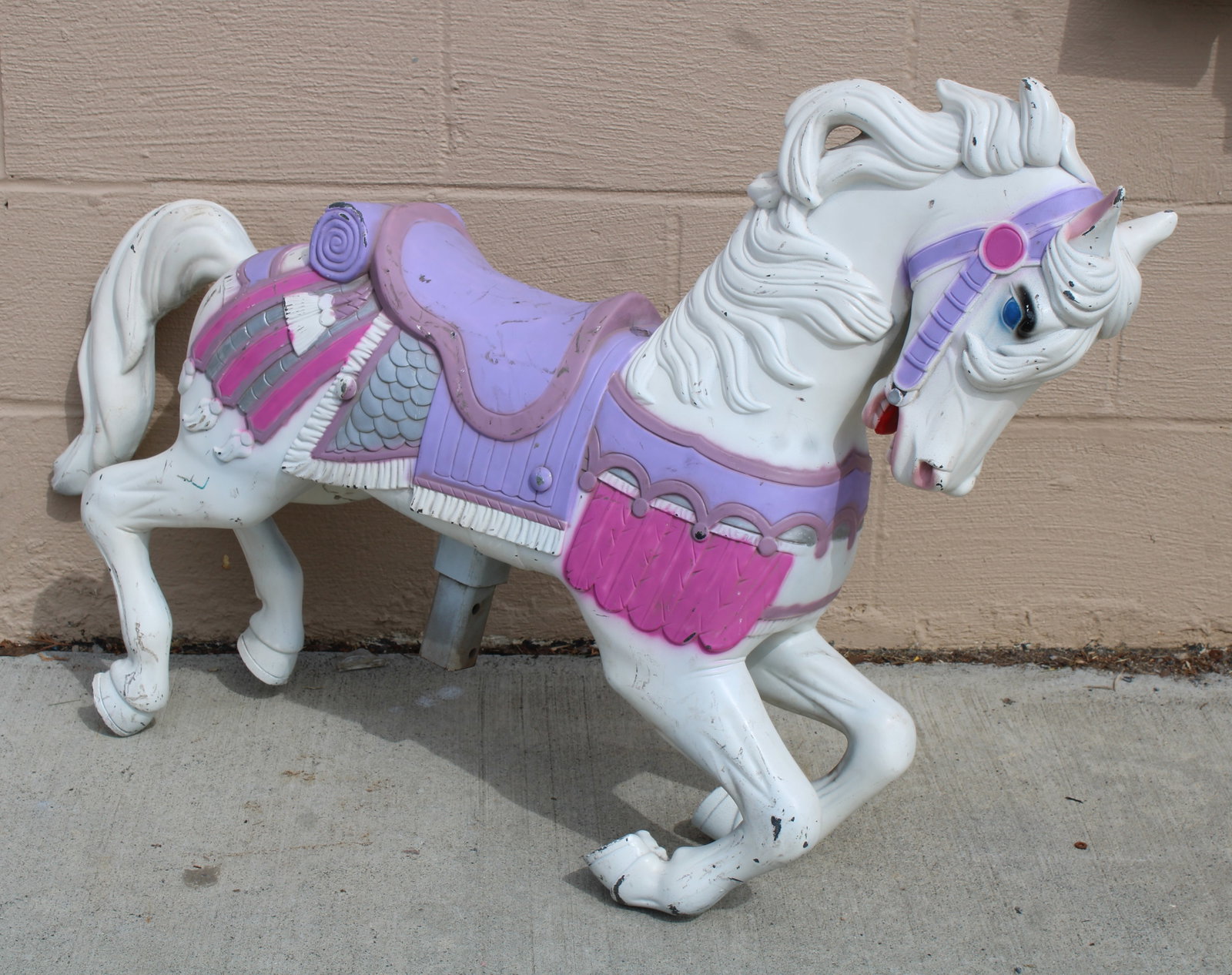 Kiddie Carousel Horse: Plastic. This item requires third-party shipping or pickup arrangements to be made. Dimensions: 27 x 9 x 39