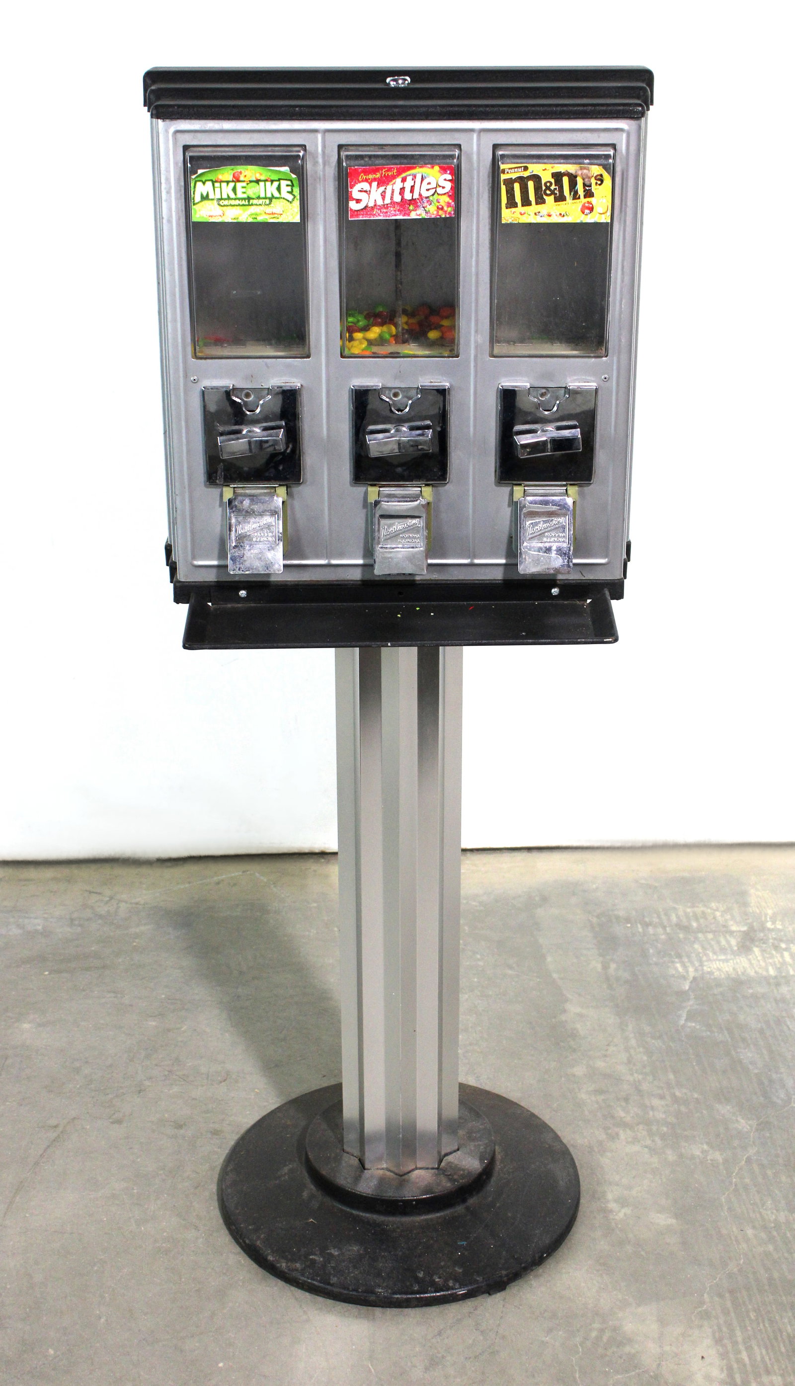 Northwestern Coin Operated Triple Vendor on Stand: No lock. This item requires third-party shipping or pickup arrangements to be made. Dimensions: 45 x 18 x 1