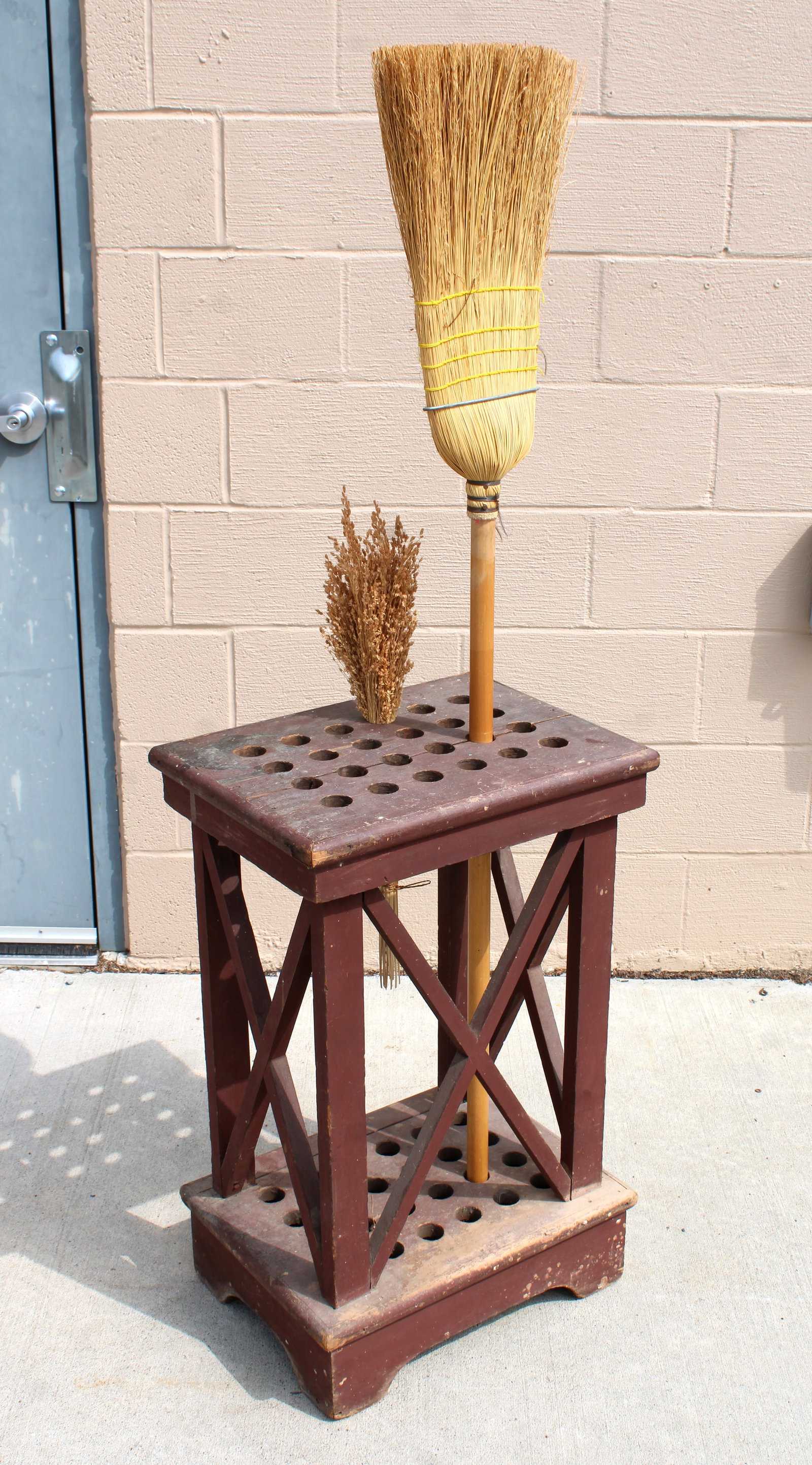 General Store Wooden Broom Holder: This item requires third-party shipping or pickup arrangements to be made. Dimensions: 30 x 19 x 14