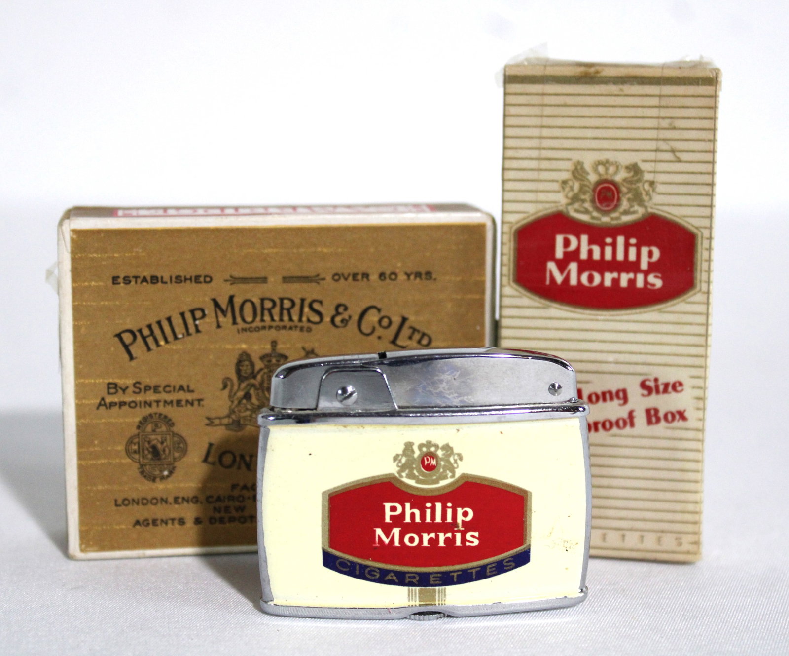 Philip Morris Lighter with Tobacco Boxes: In-house shipping available. Dimensions of Lighter: 1 x 2