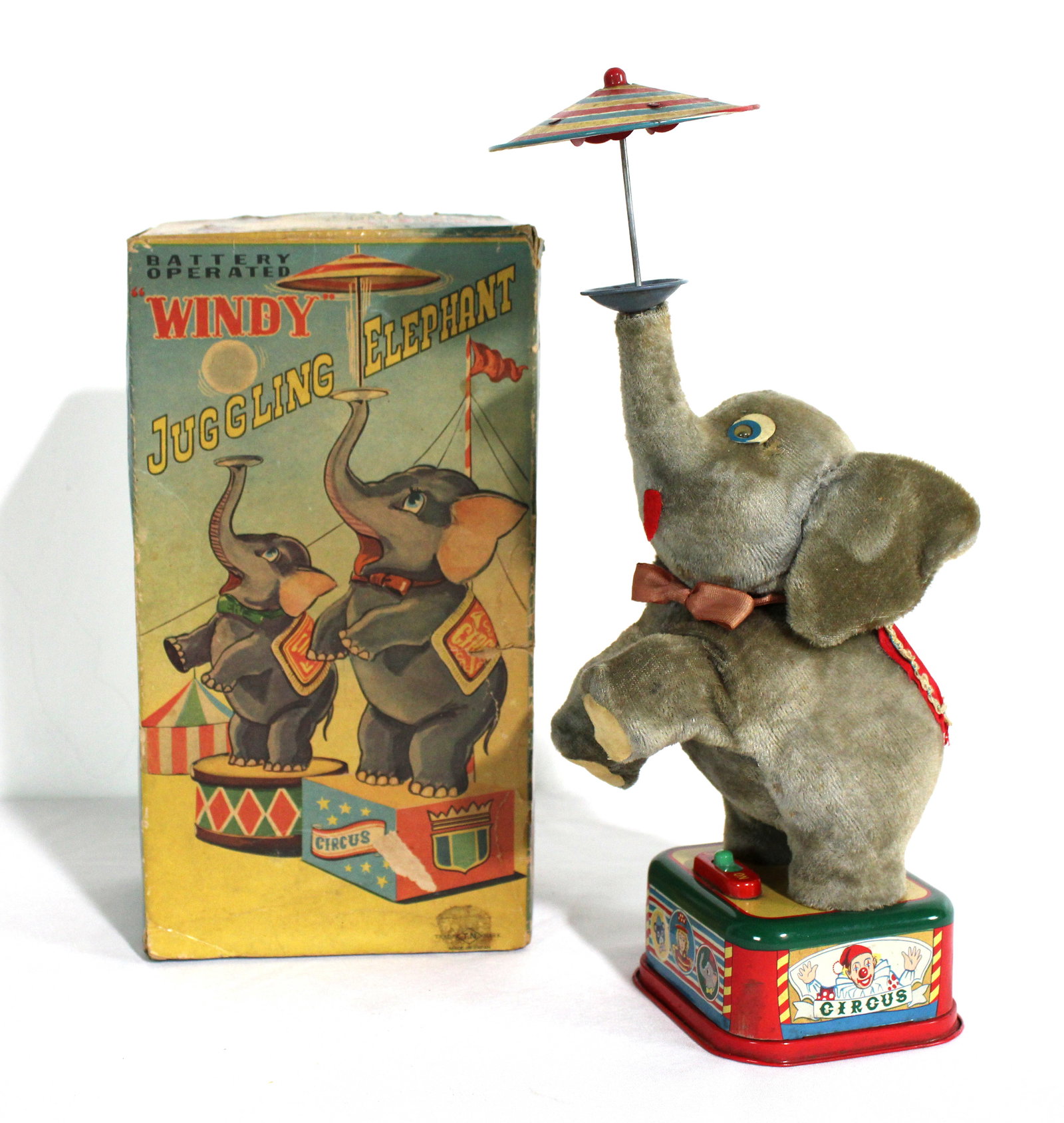 Juggling Elephant "Windy" Tin Toy with Box: In-house shipping available. Dimensions of box: 10 x 6 x 5