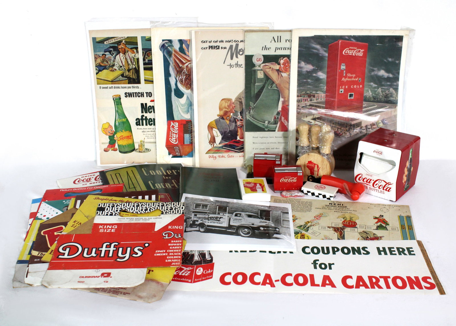 Coca Cola and Other Soda Collectibles: Manuals are both reprints. Mix of vintage and contemporary items. In-house shipping available.