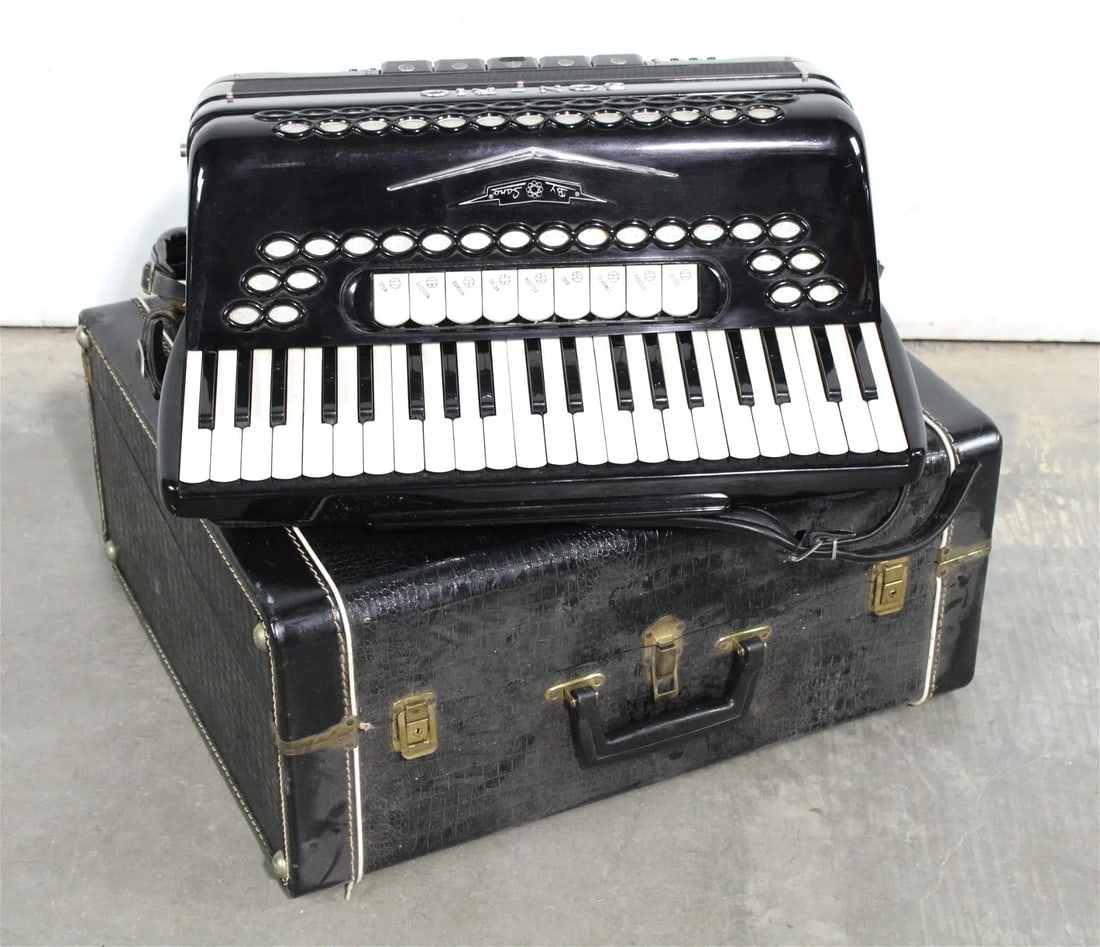 Zon-Rio Italian Accordian in Case: This item requires third-party shipping or pickup arrangements to be made. Dimensions of case: 20 x 23 x 10